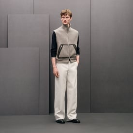 Vest with leather details	