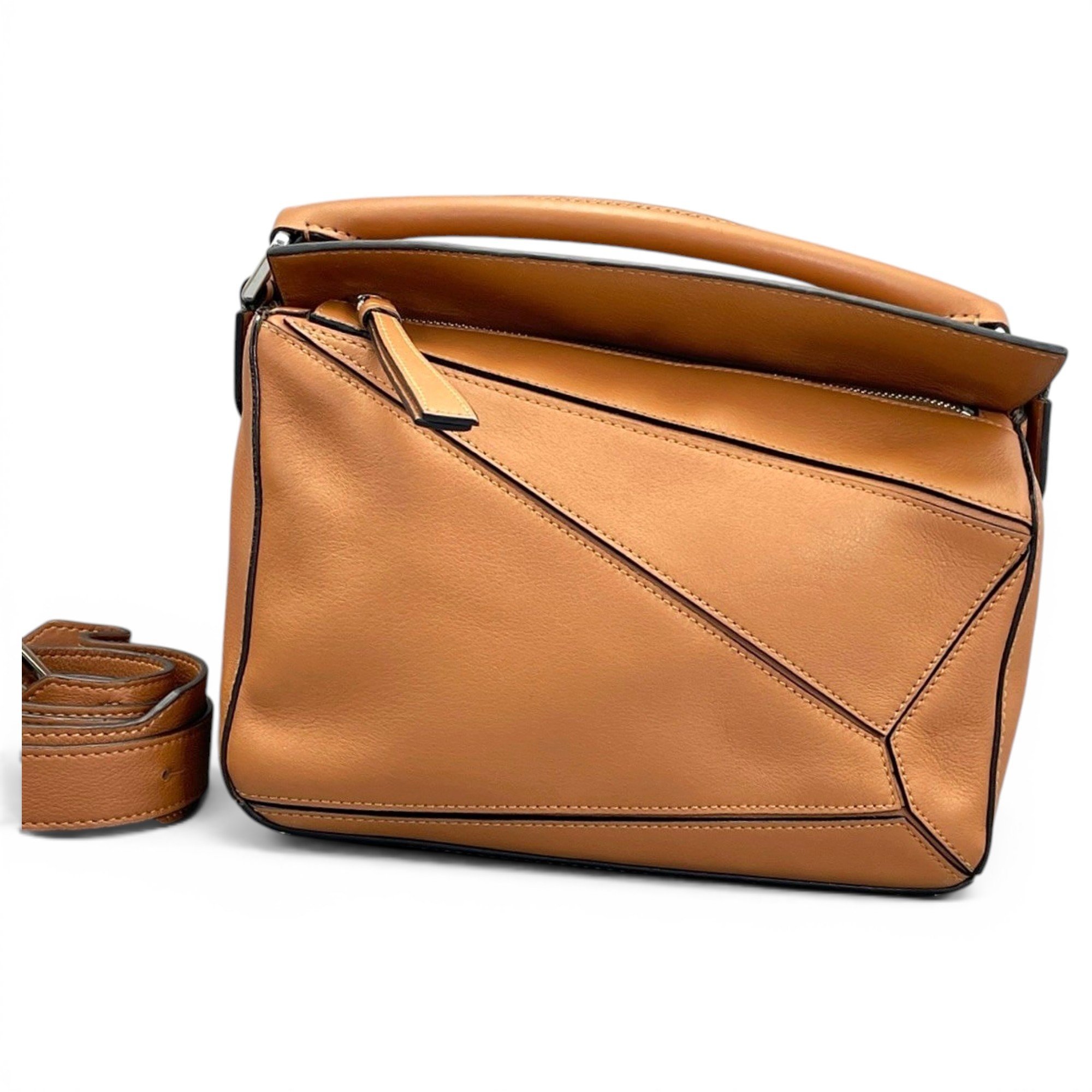 Puzzle leather handbag