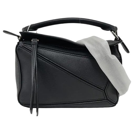 Puzzle leather handbag