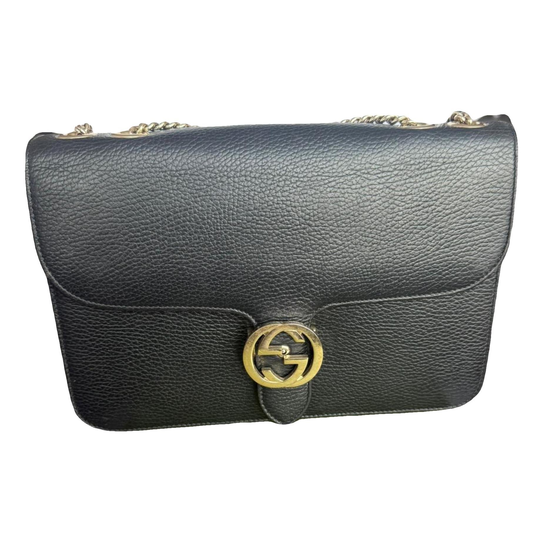 Interlocking leather handbag