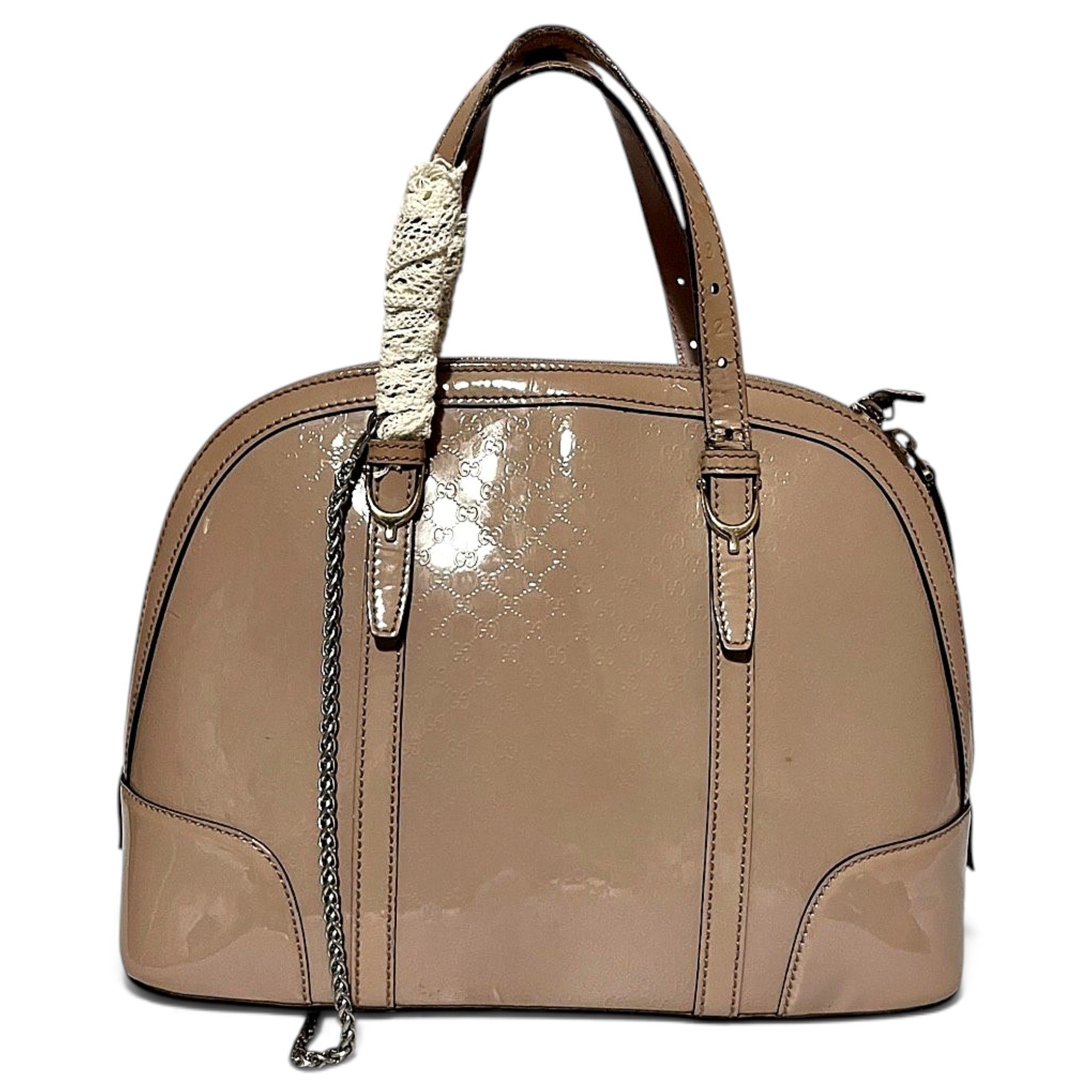 Dôme patent leather handbag