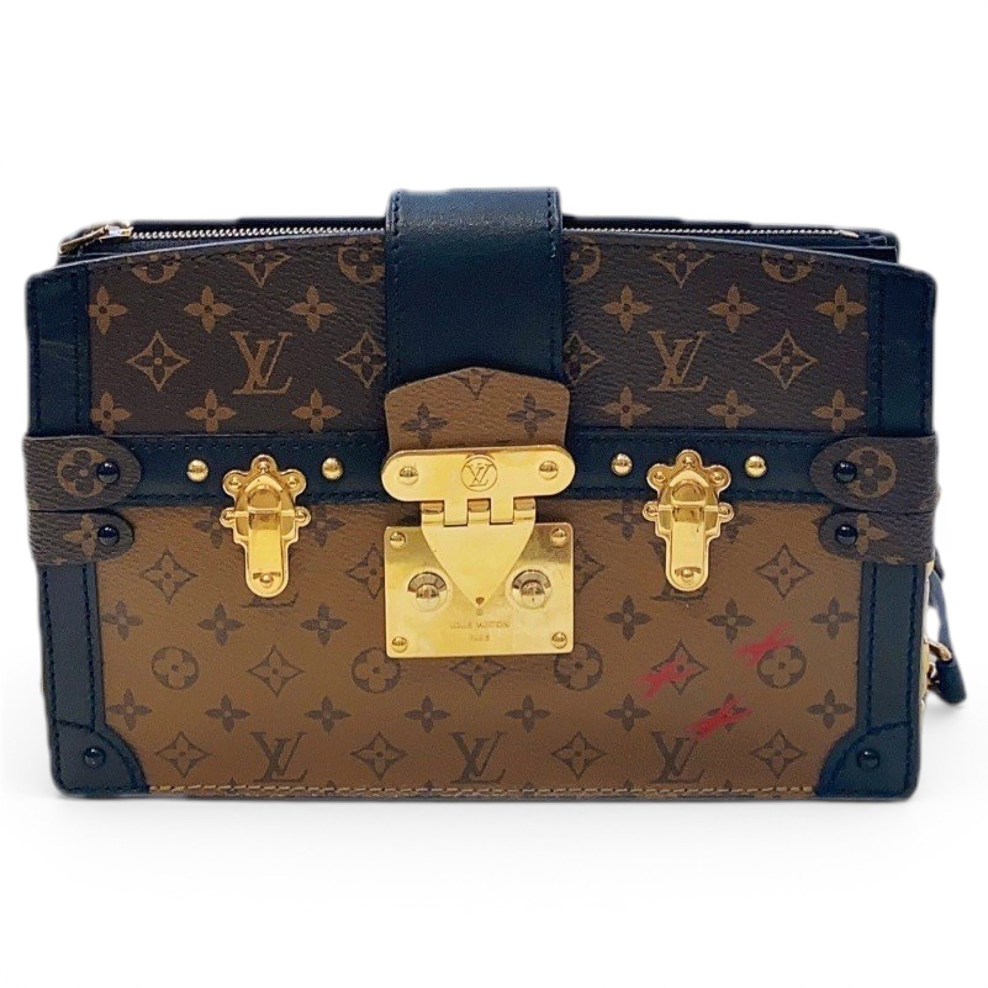 Pochette Trunk leather handbag