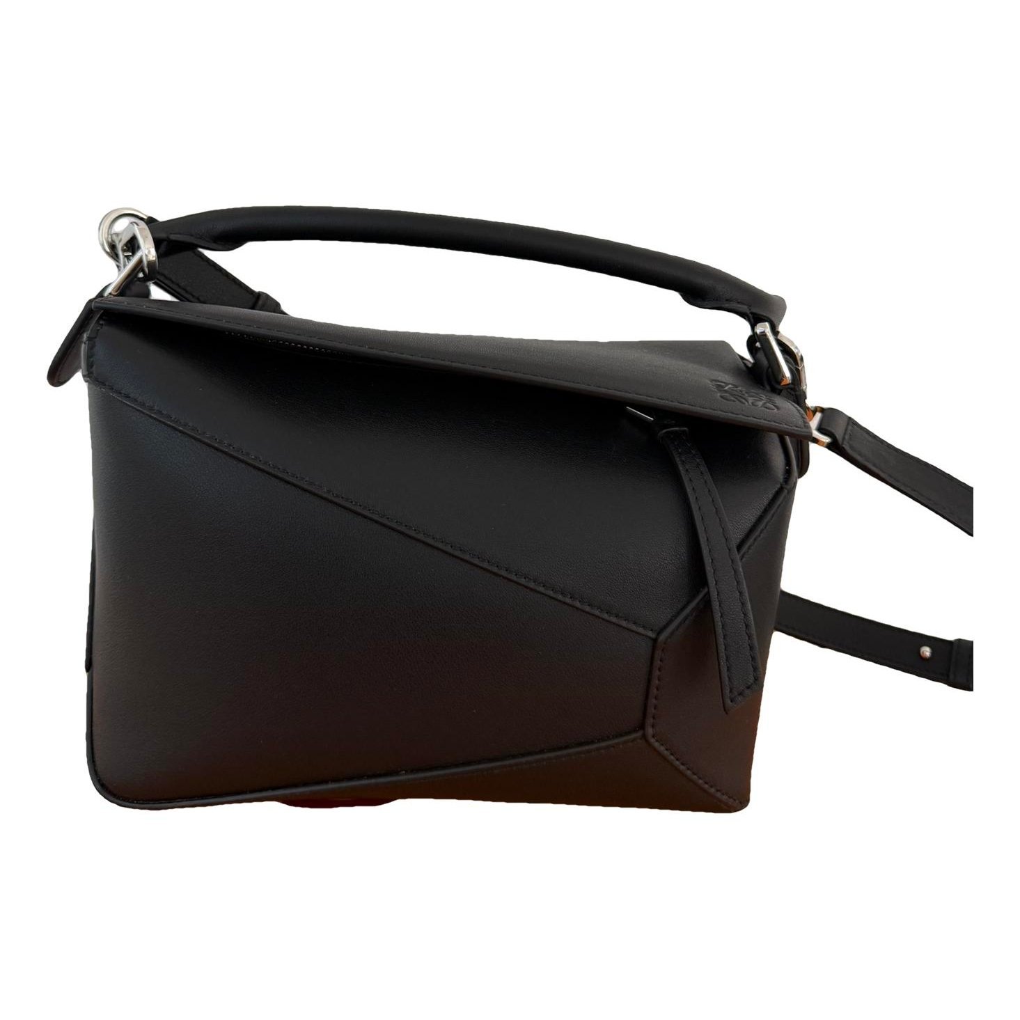 Puzzle leather handbag