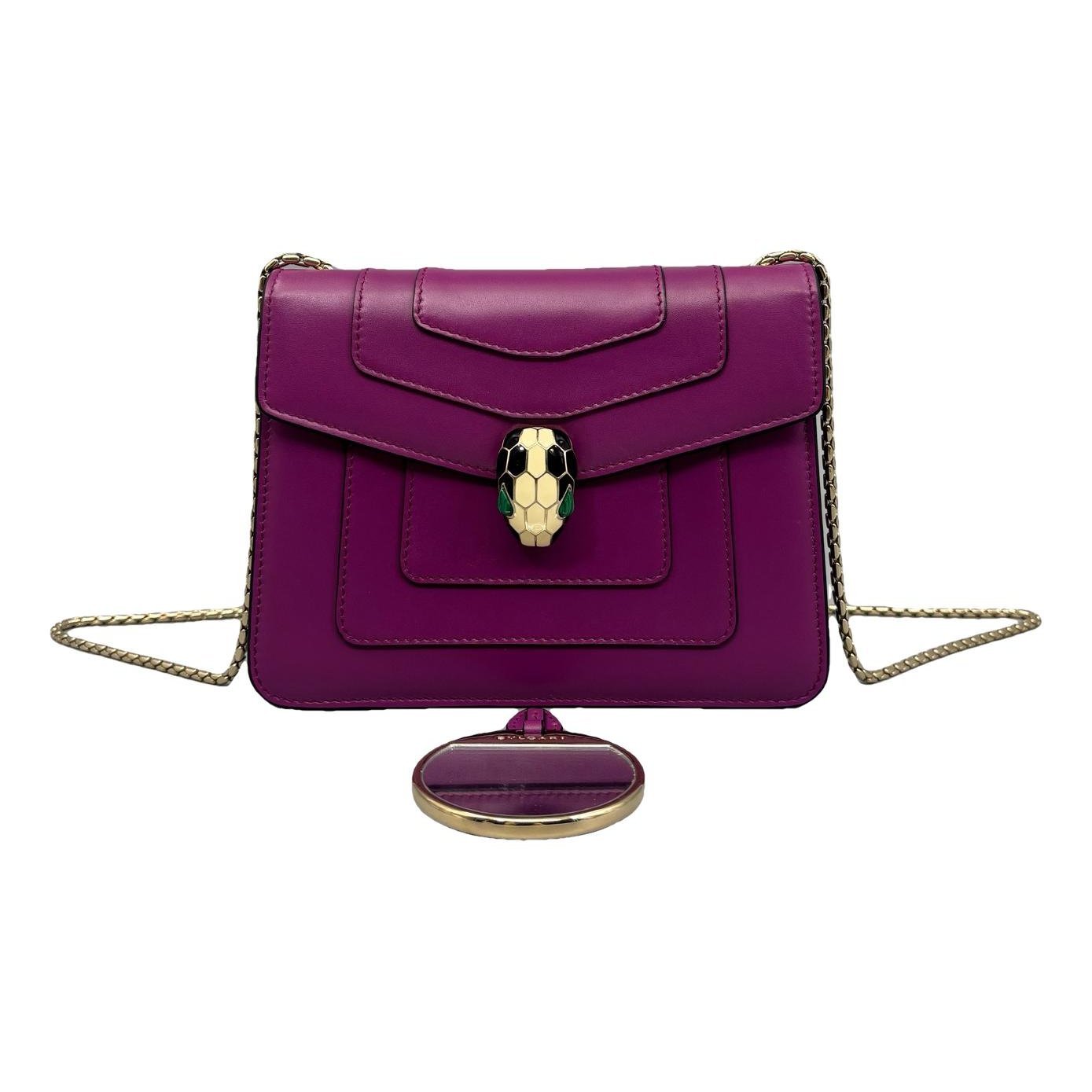 Serpenti leather handbag