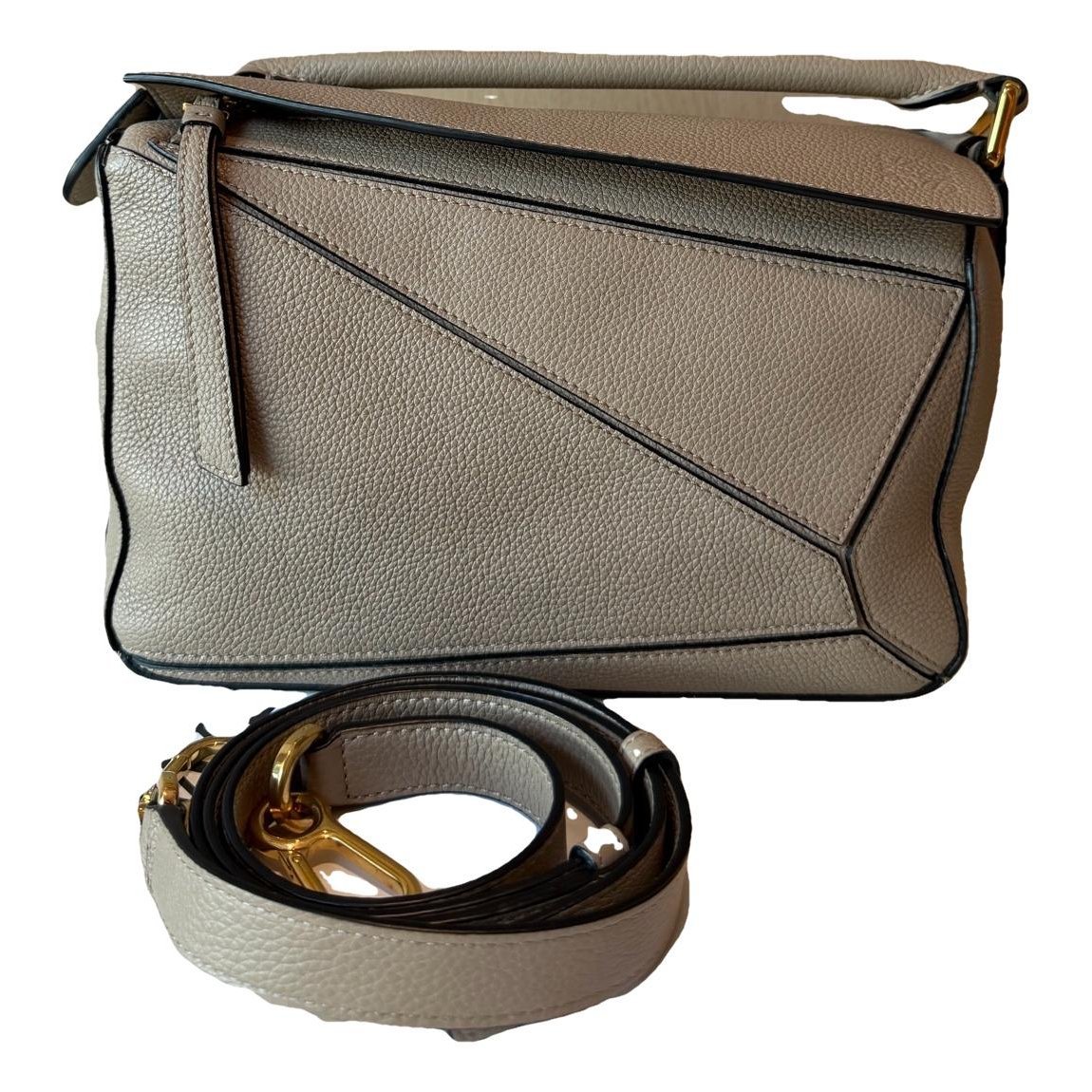 Puzzle leather handbag