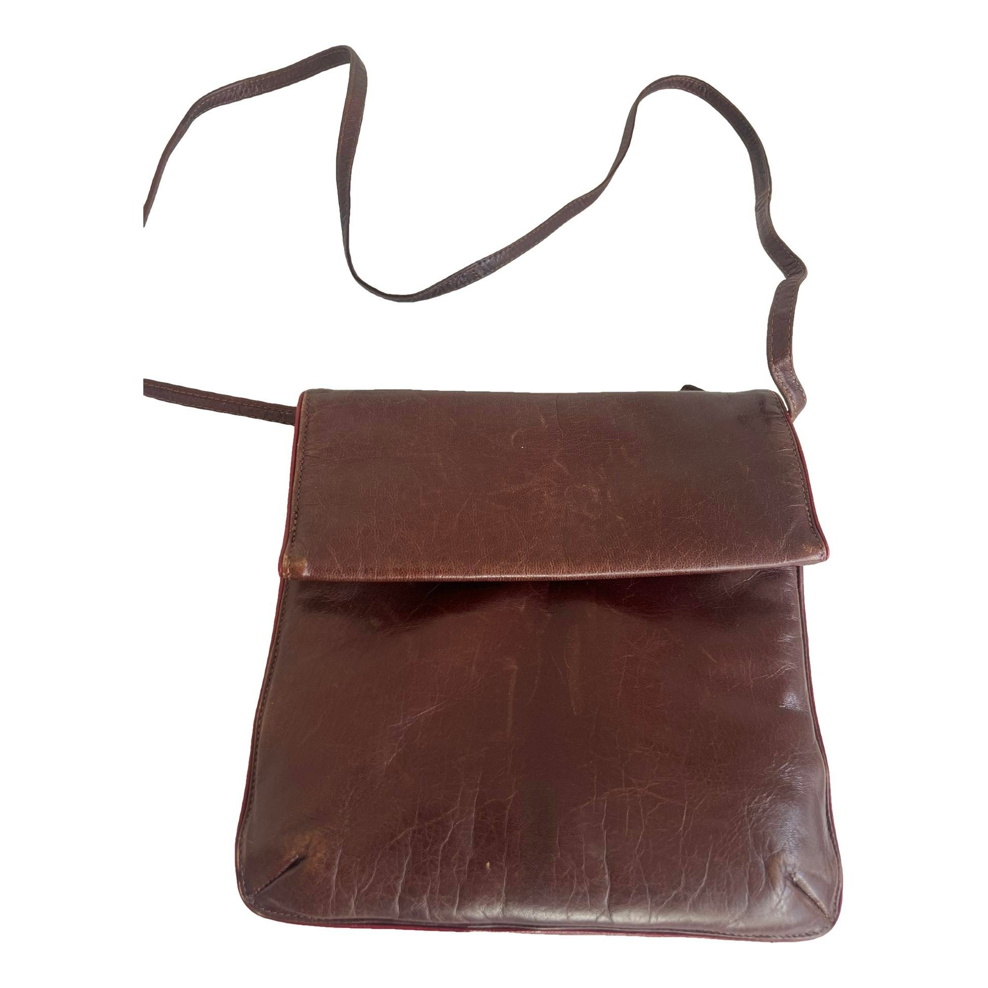 Clip leather handbag