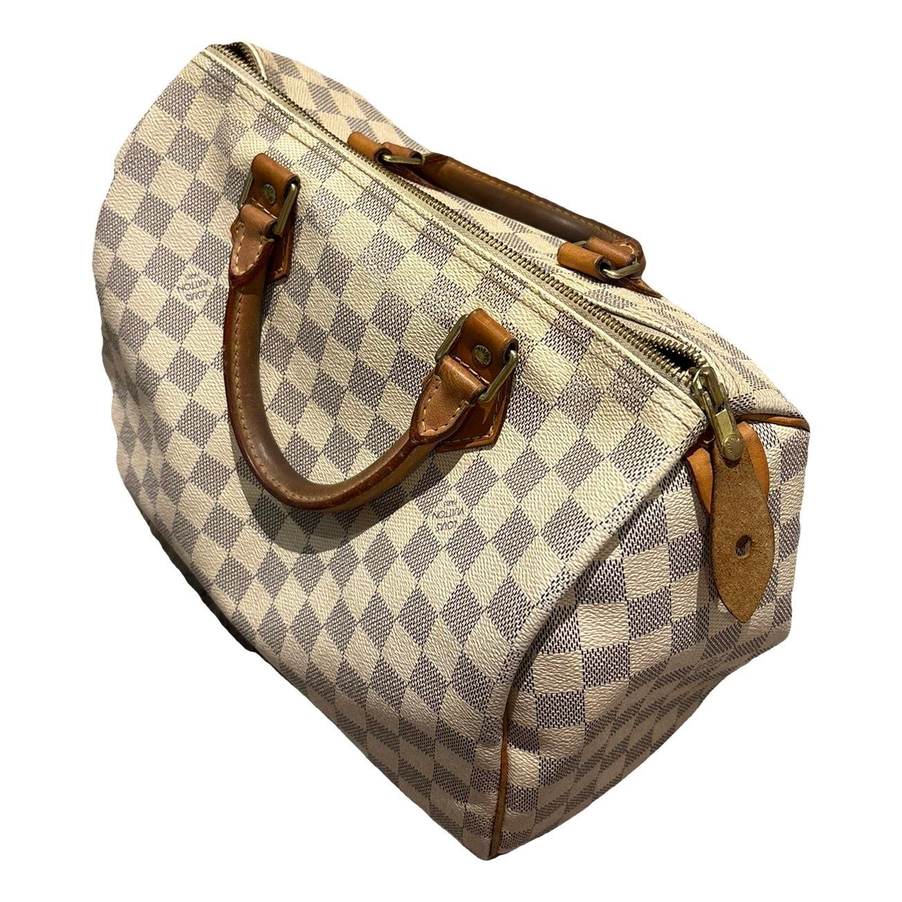 Speedy leather handbag