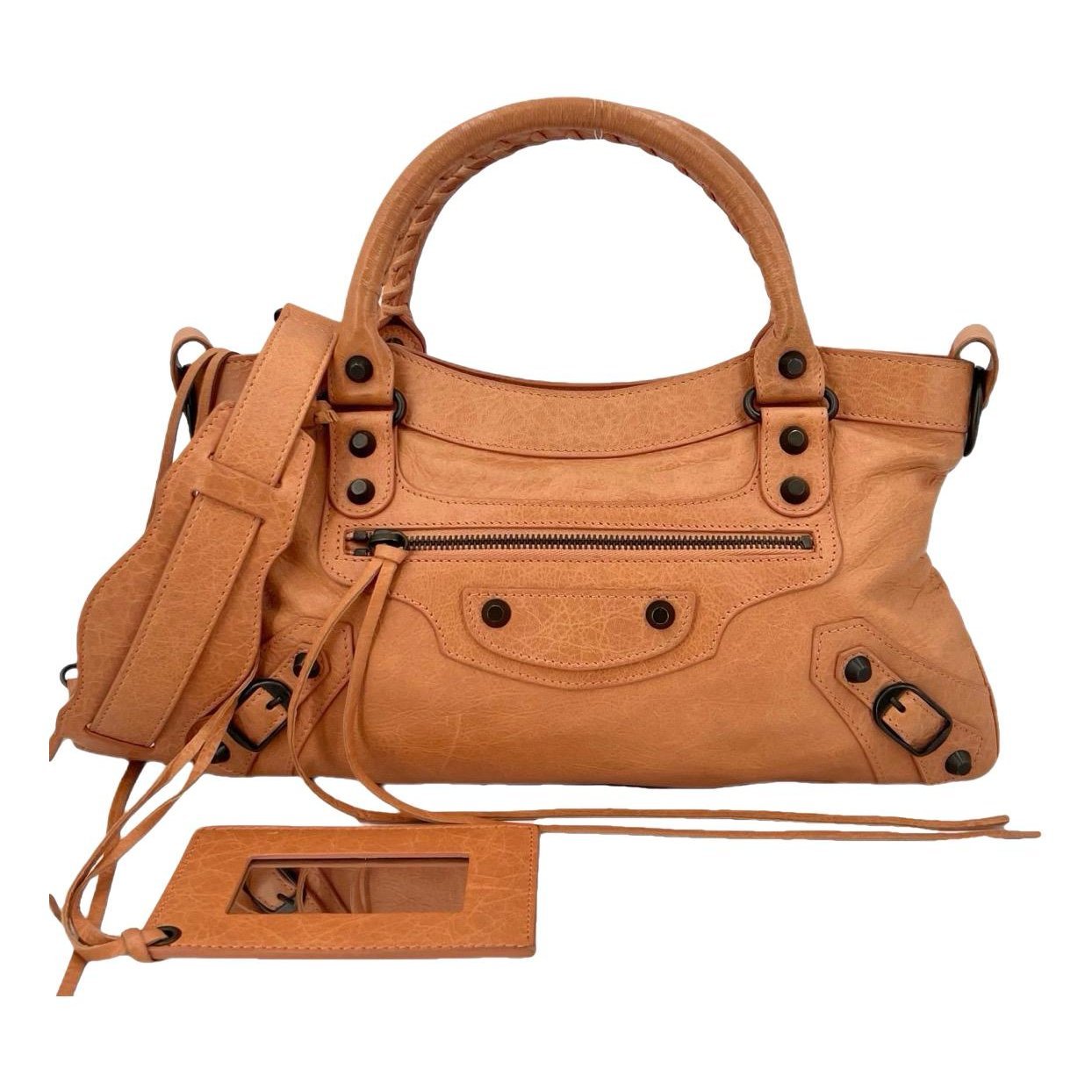 First leather handbag