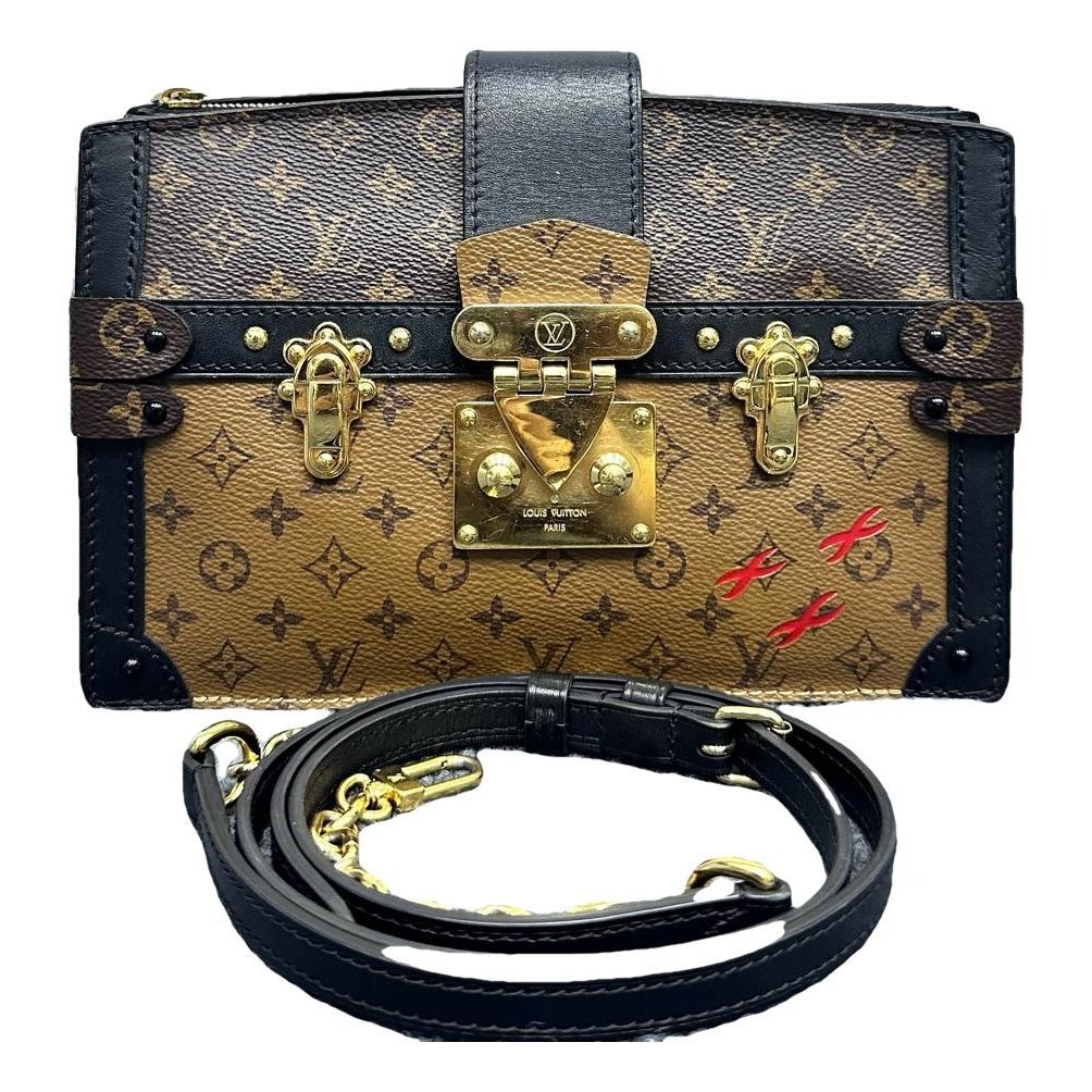 Louis Vuitton Pochette Trunk leather handbag