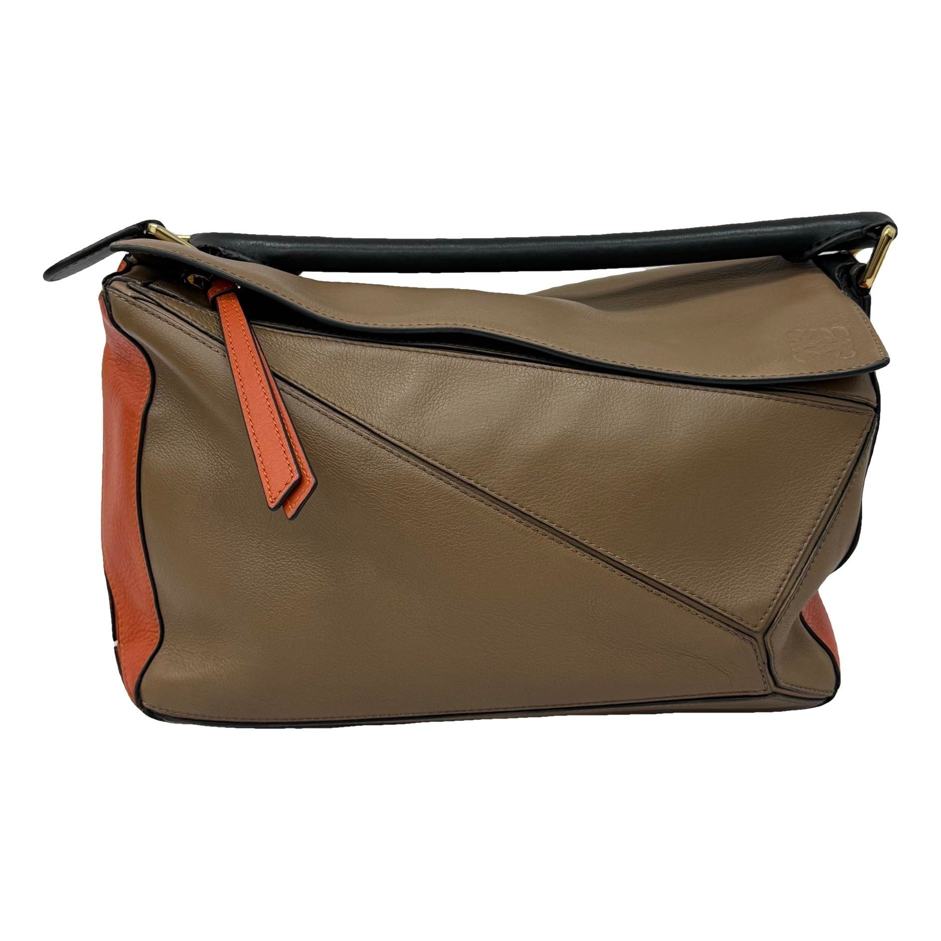 Puzzle leather handbag