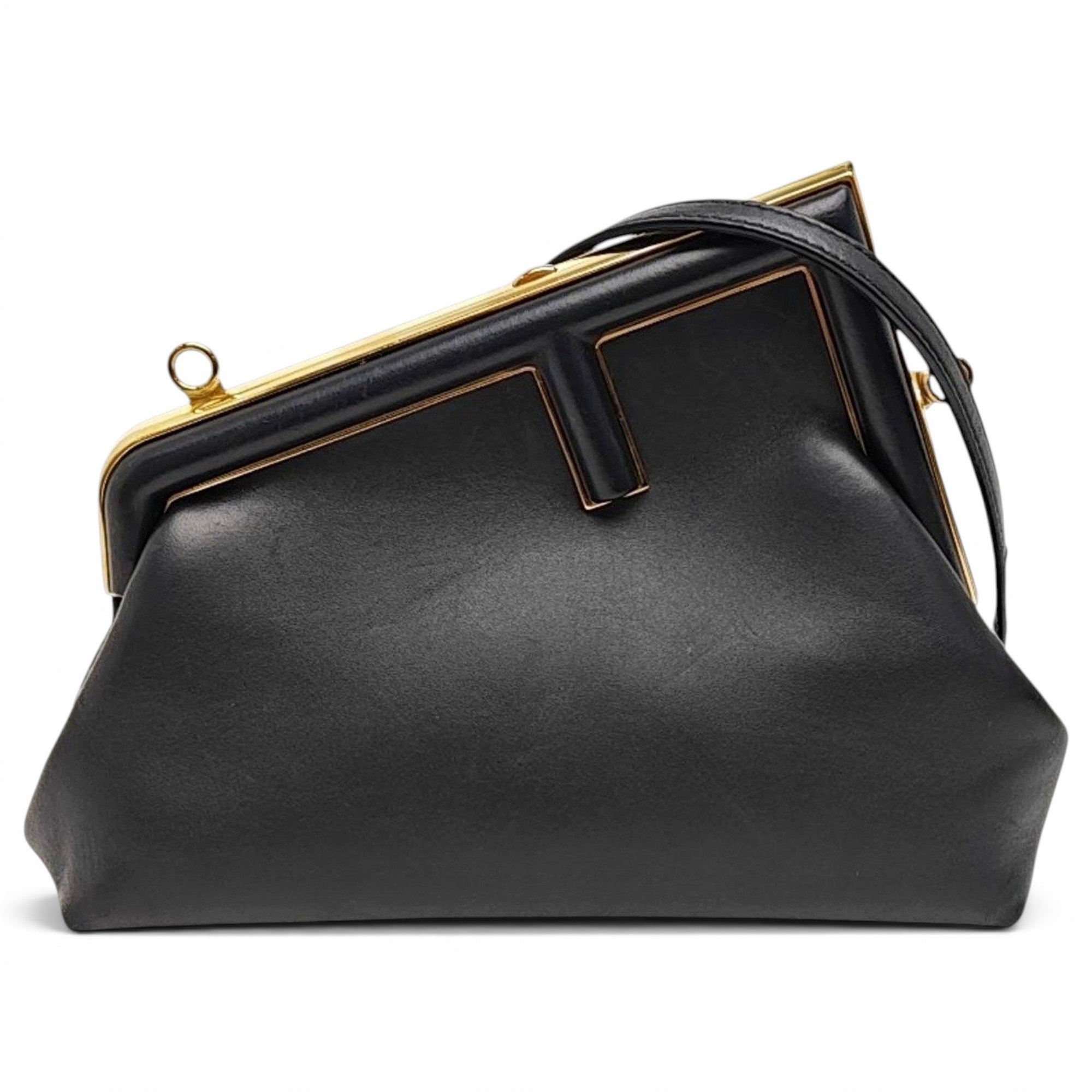 First leather handbag