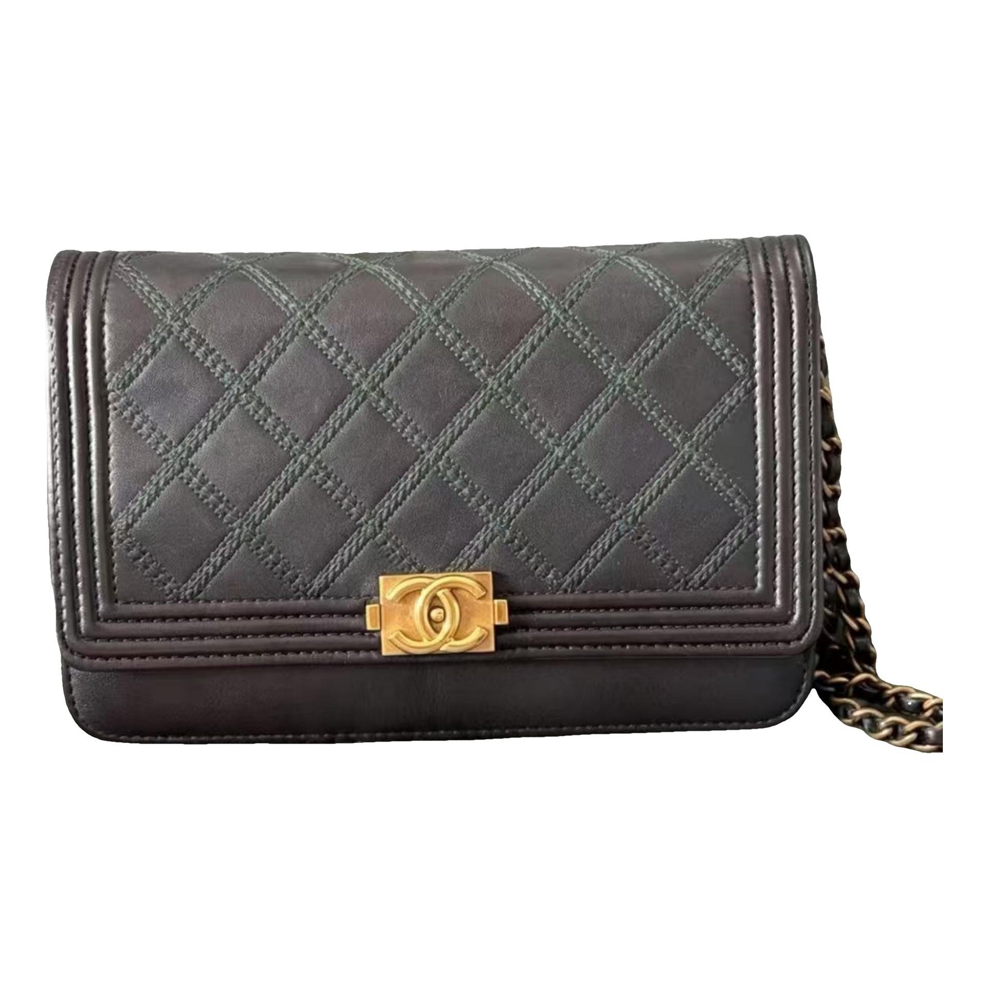 Wallet On Chain Boy Half Flap leather crossbody bag