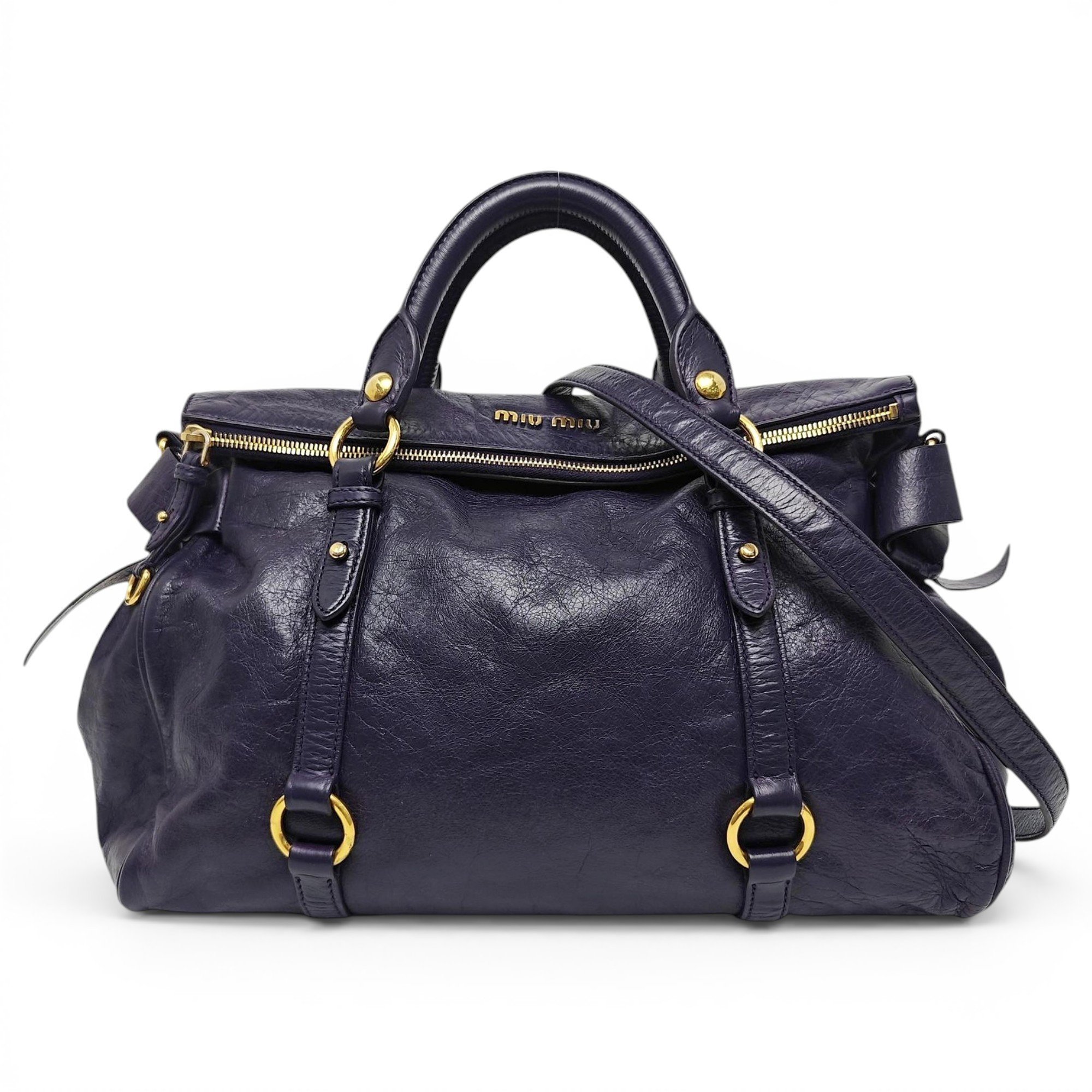 Bow bag leather handbag