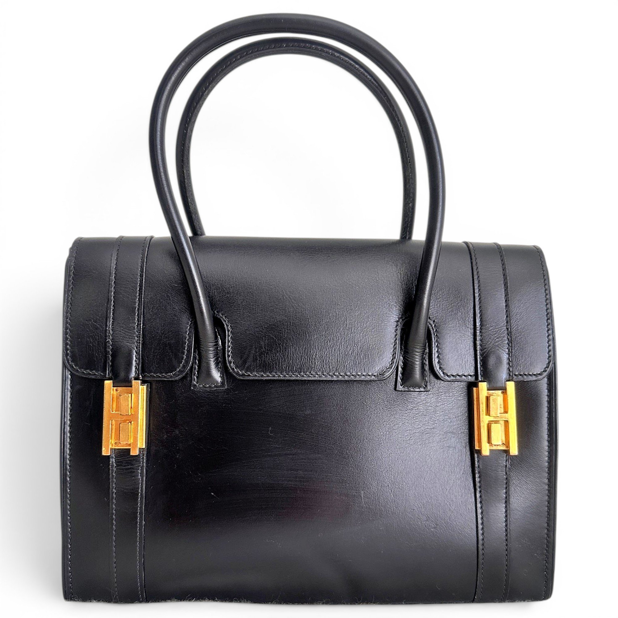Drag leather handbag