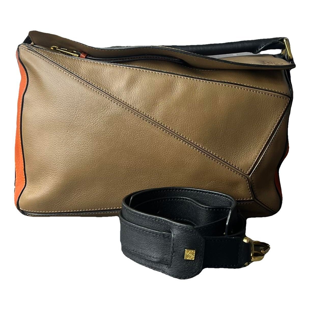 Puzzle leather handbag