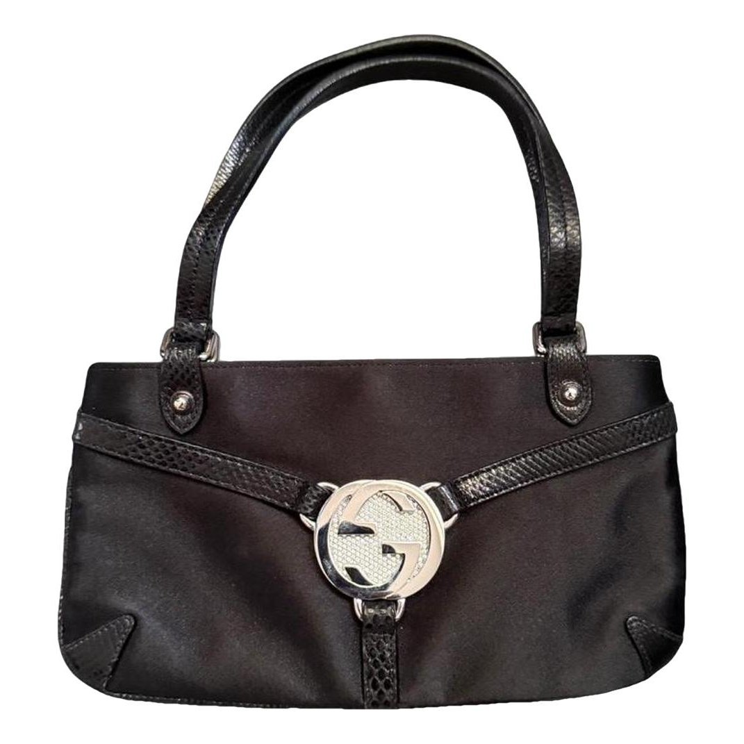 Interlocking silk handbag