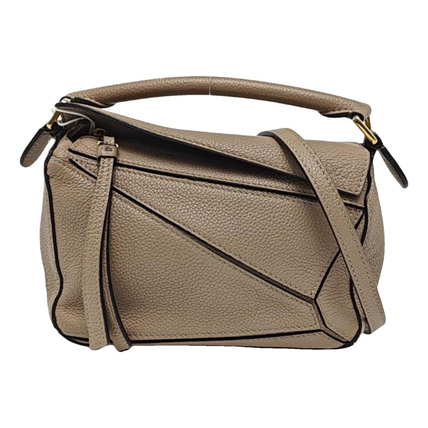 Puzzle leather handbag