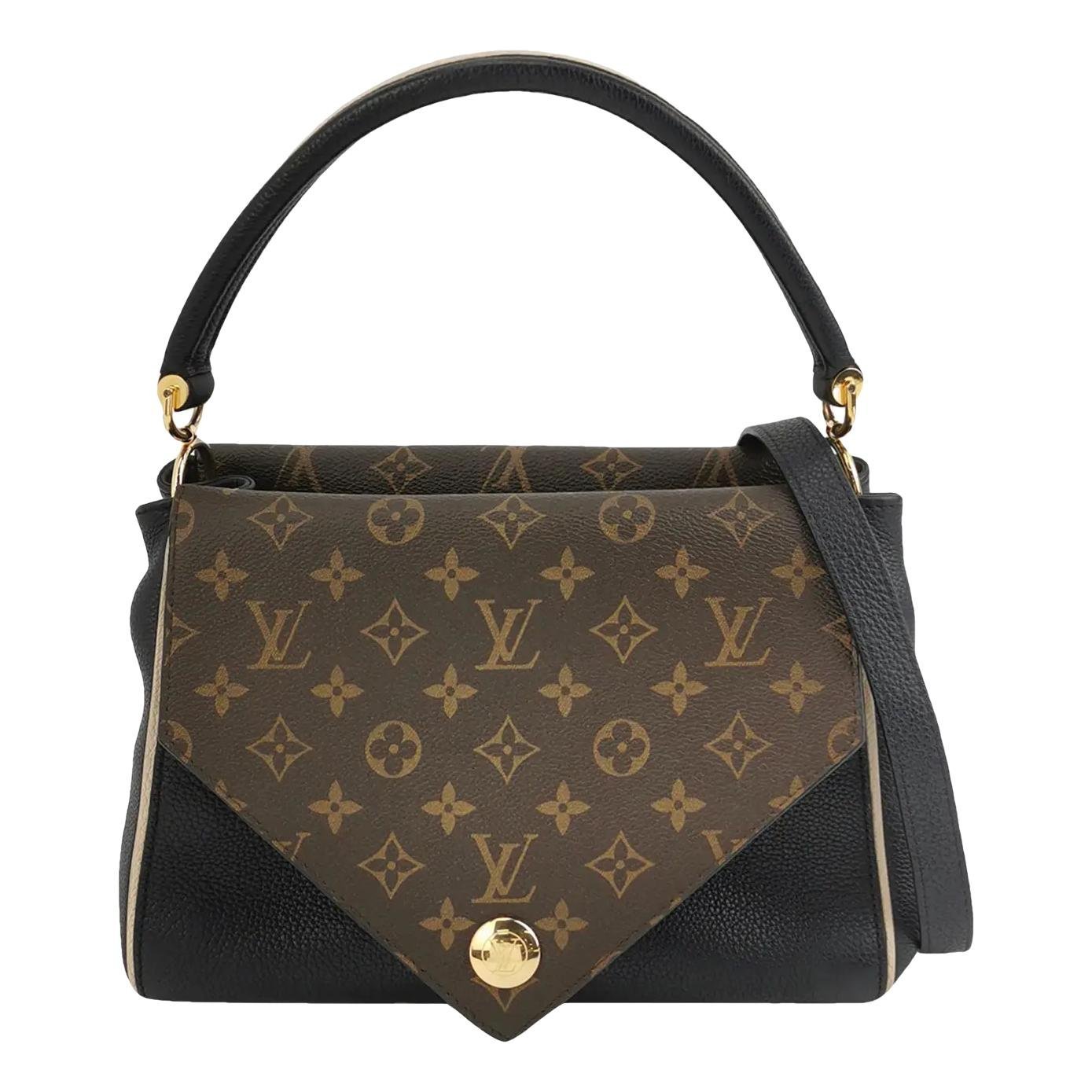 Double V vinyl handbag