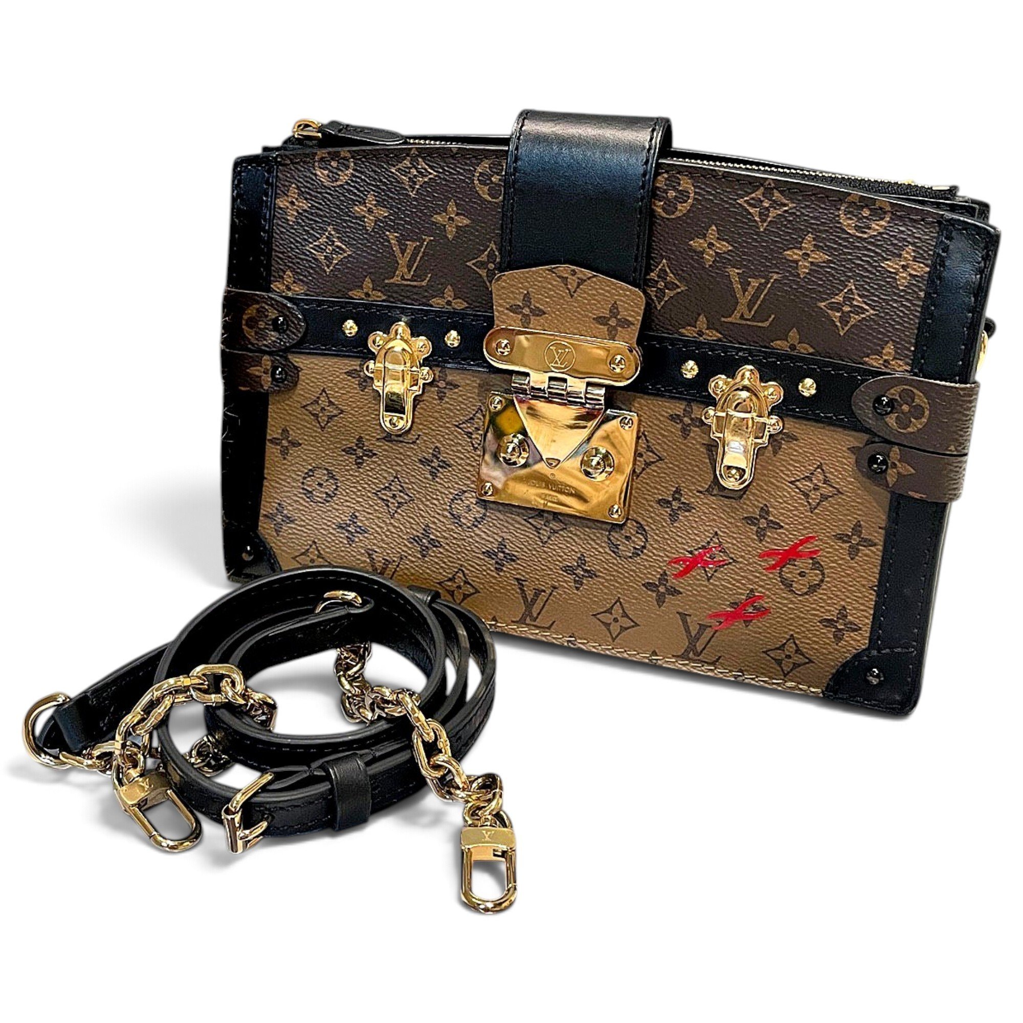 Pochette Trunk leather handbag