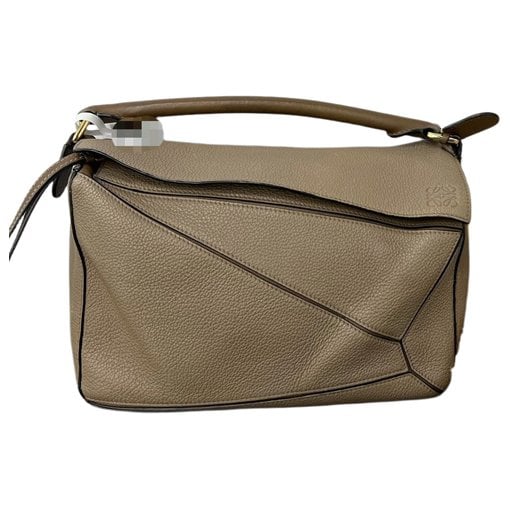 Puzzle leather handbag