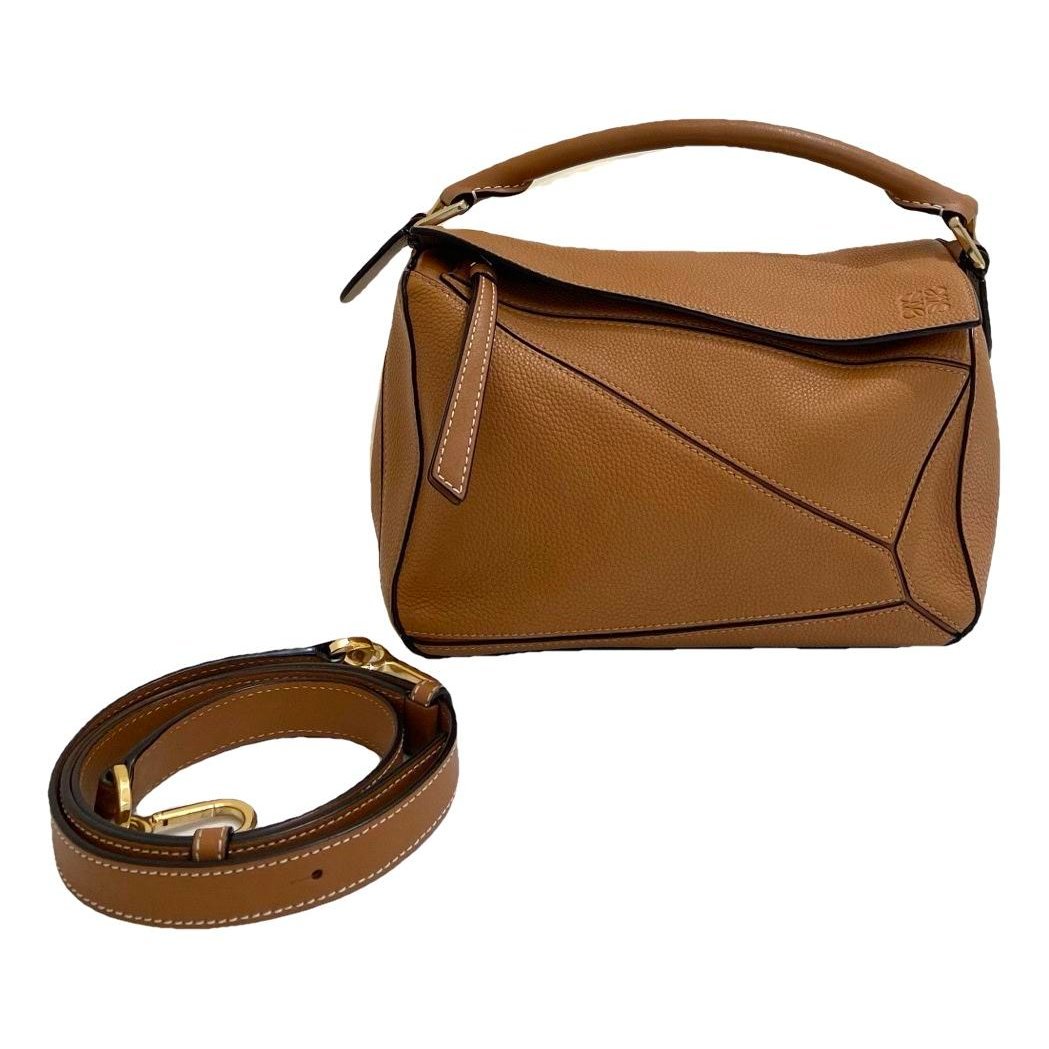 Puzzle leather handbag