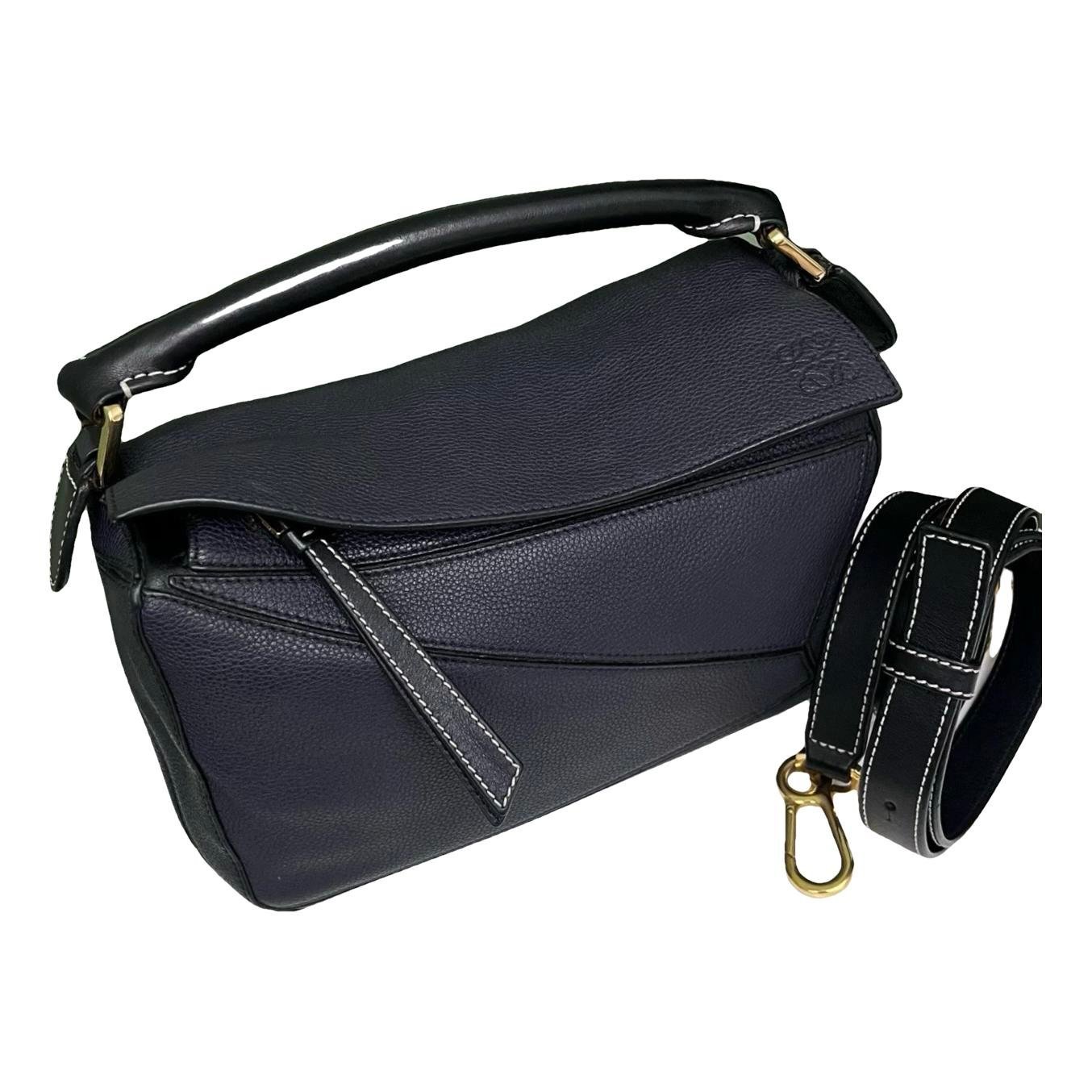 Puzzle leather handbag