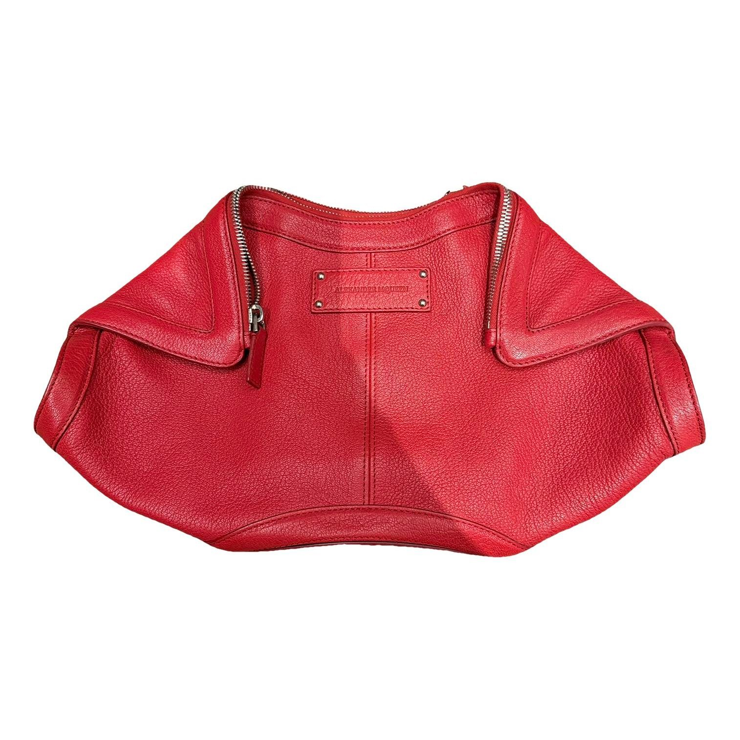 Manta leather clutch bag