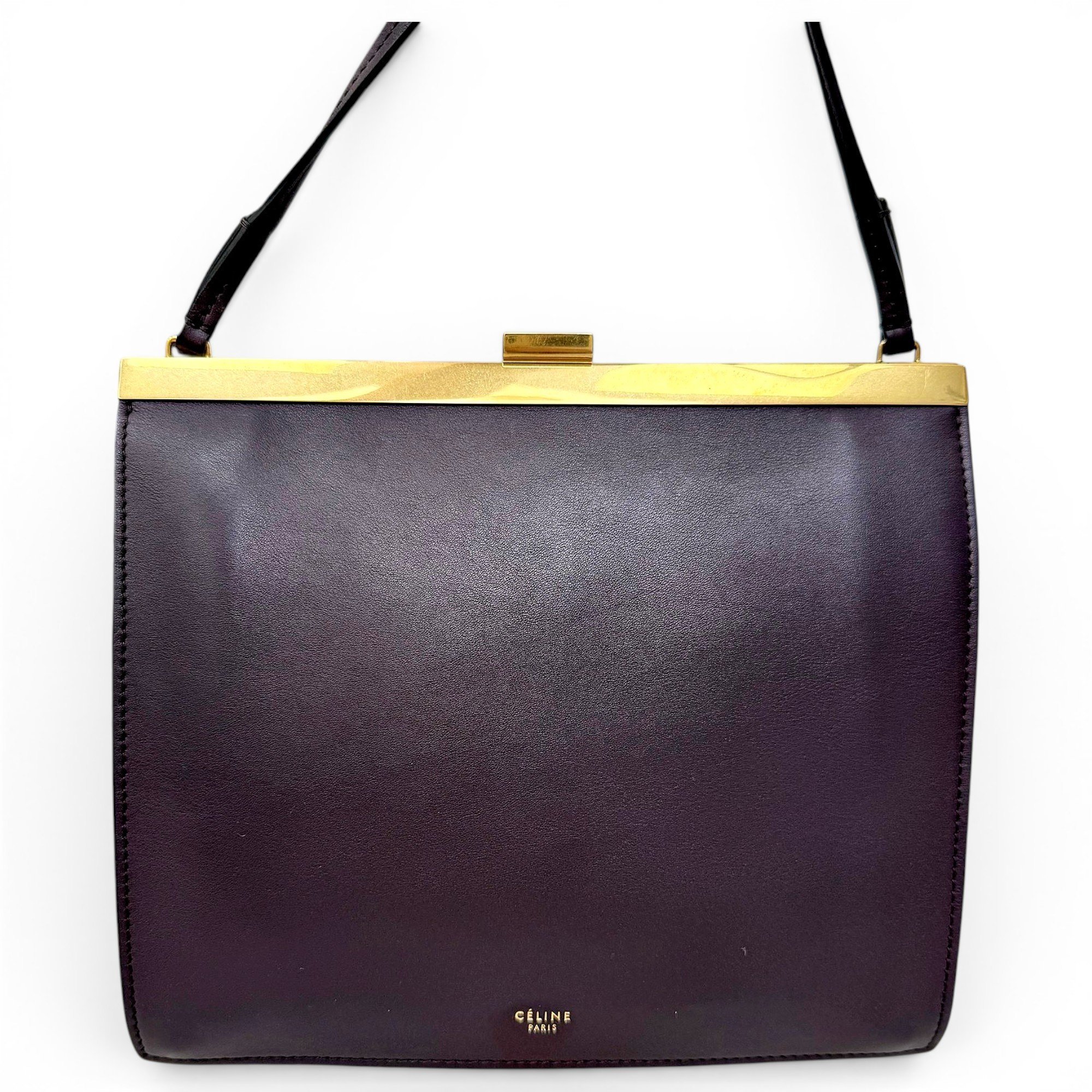 Clasp leather handbag