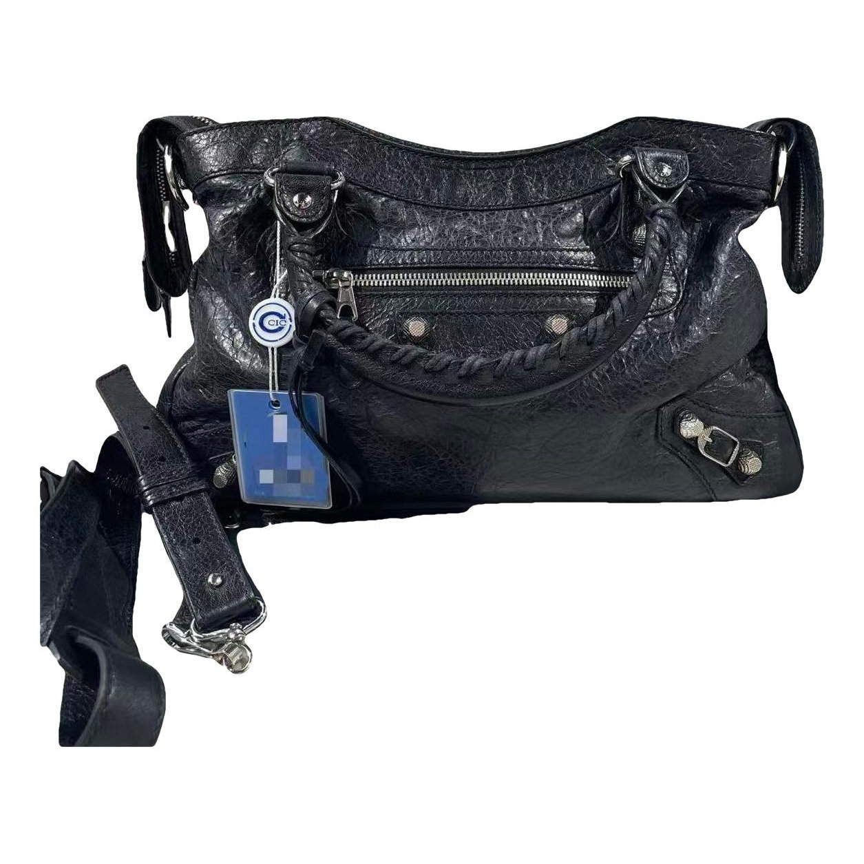 B leather handbag