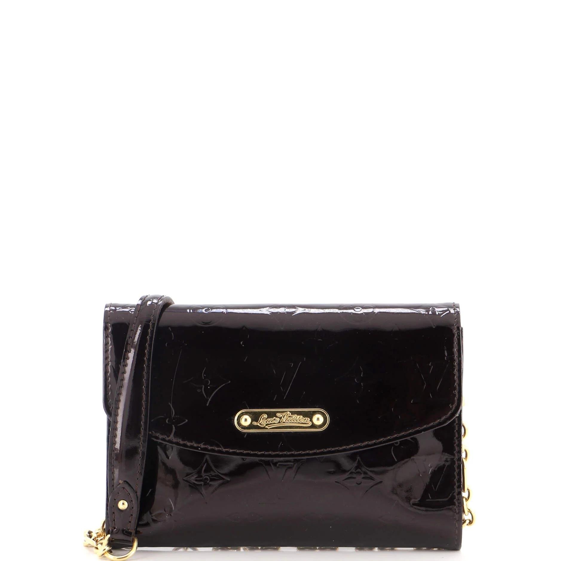 Patent leather clutch bag