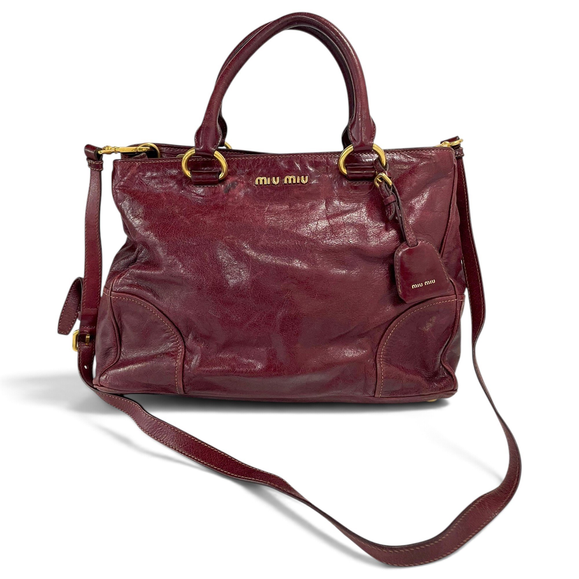 Bow bag leather handbag