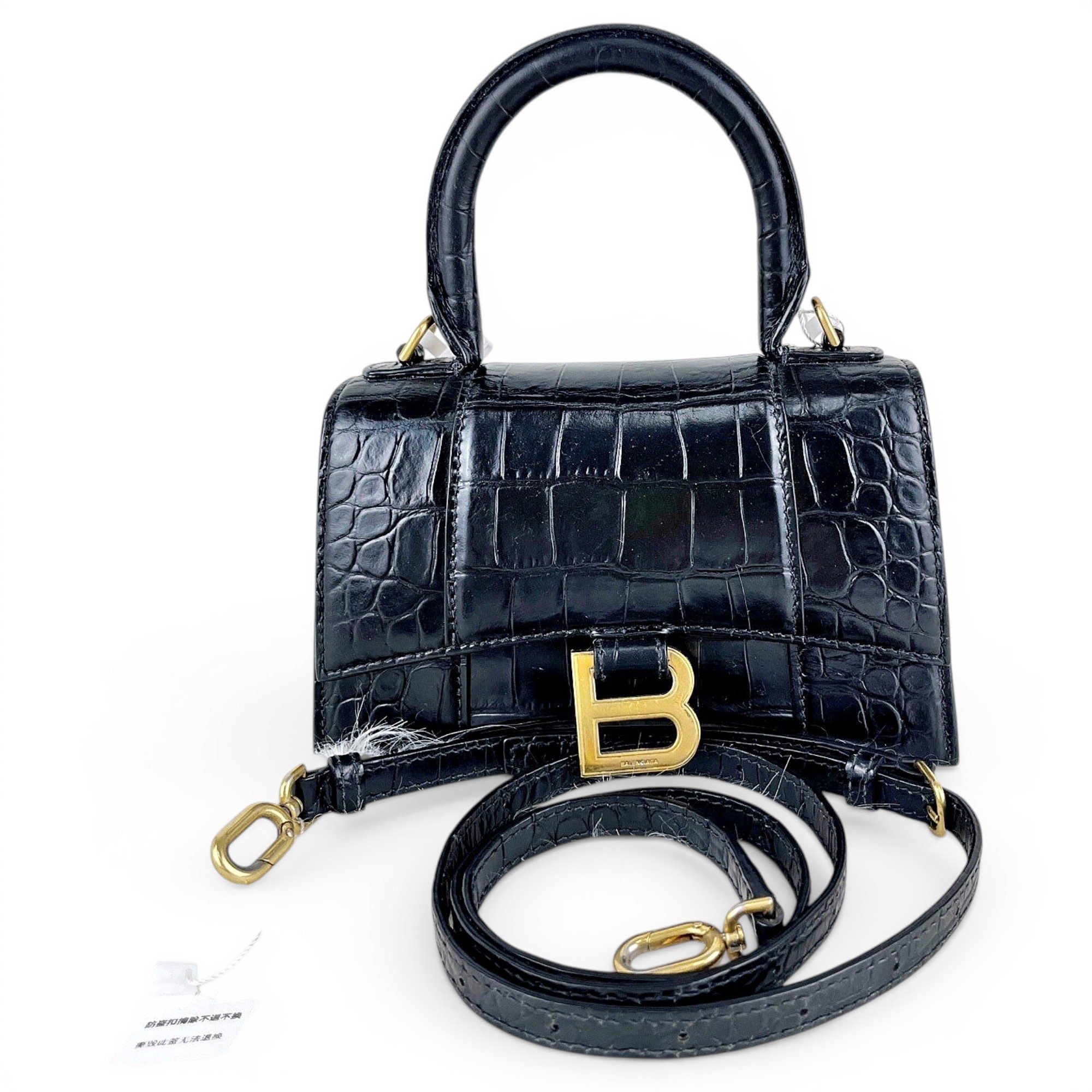 Hourglass leather handbag