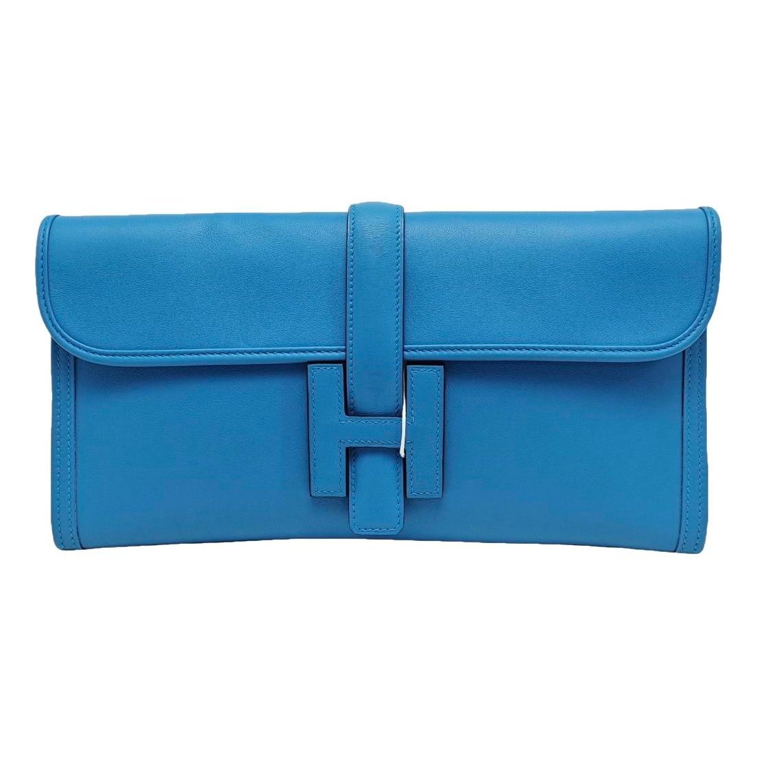 Jige leather clutch bag