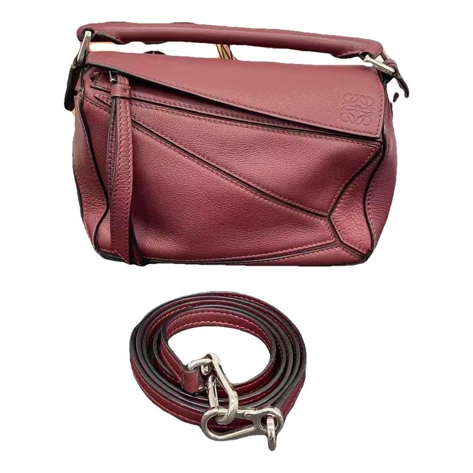 Puzzle leather handbag