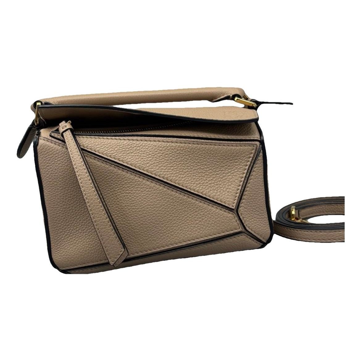 Puzzle leather handbag