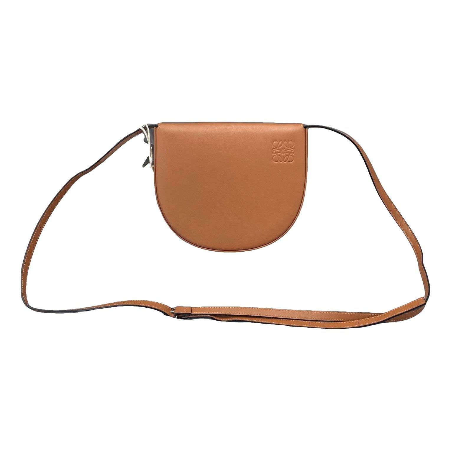 Heel leather handbag