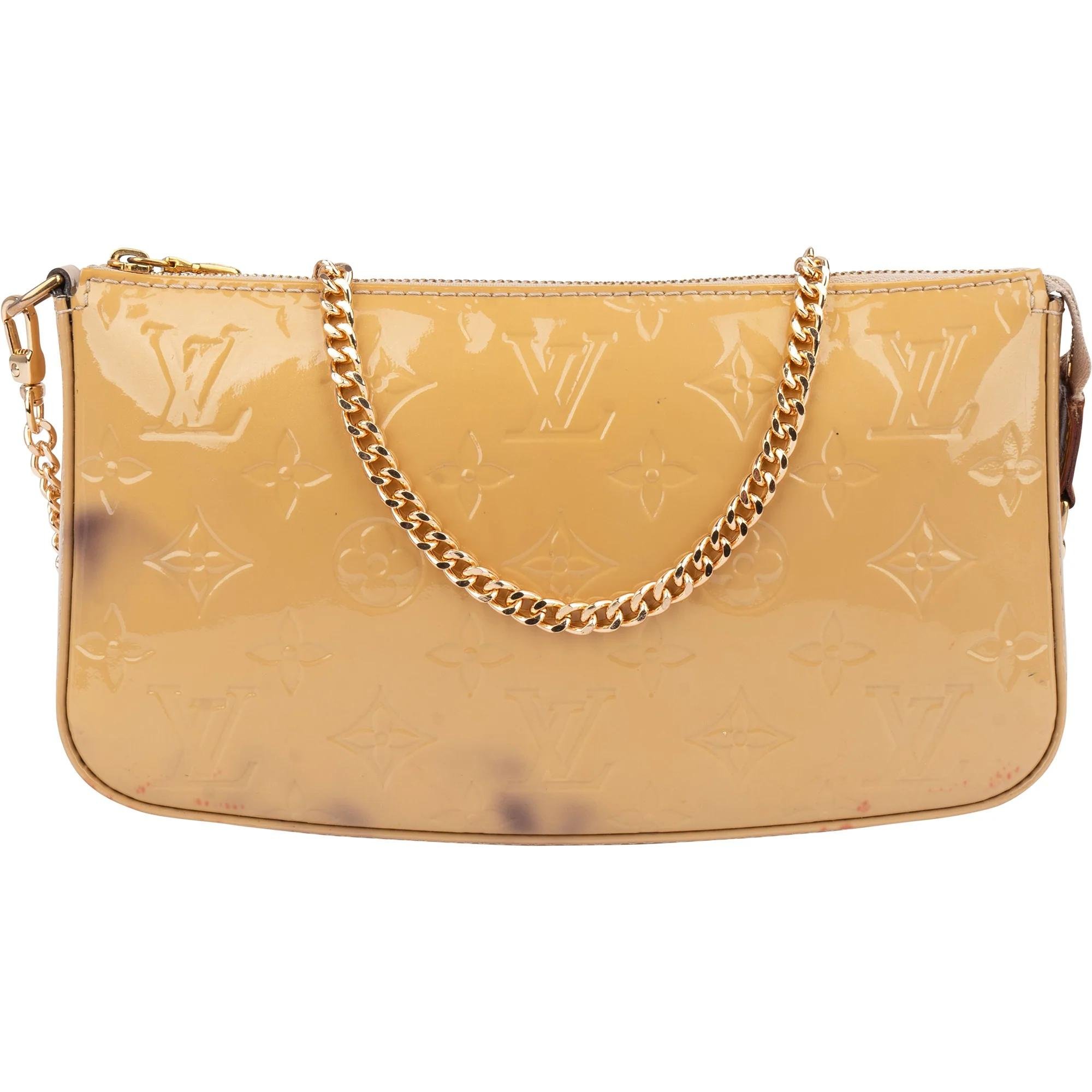 Pochette Accessoire patent leather handbag