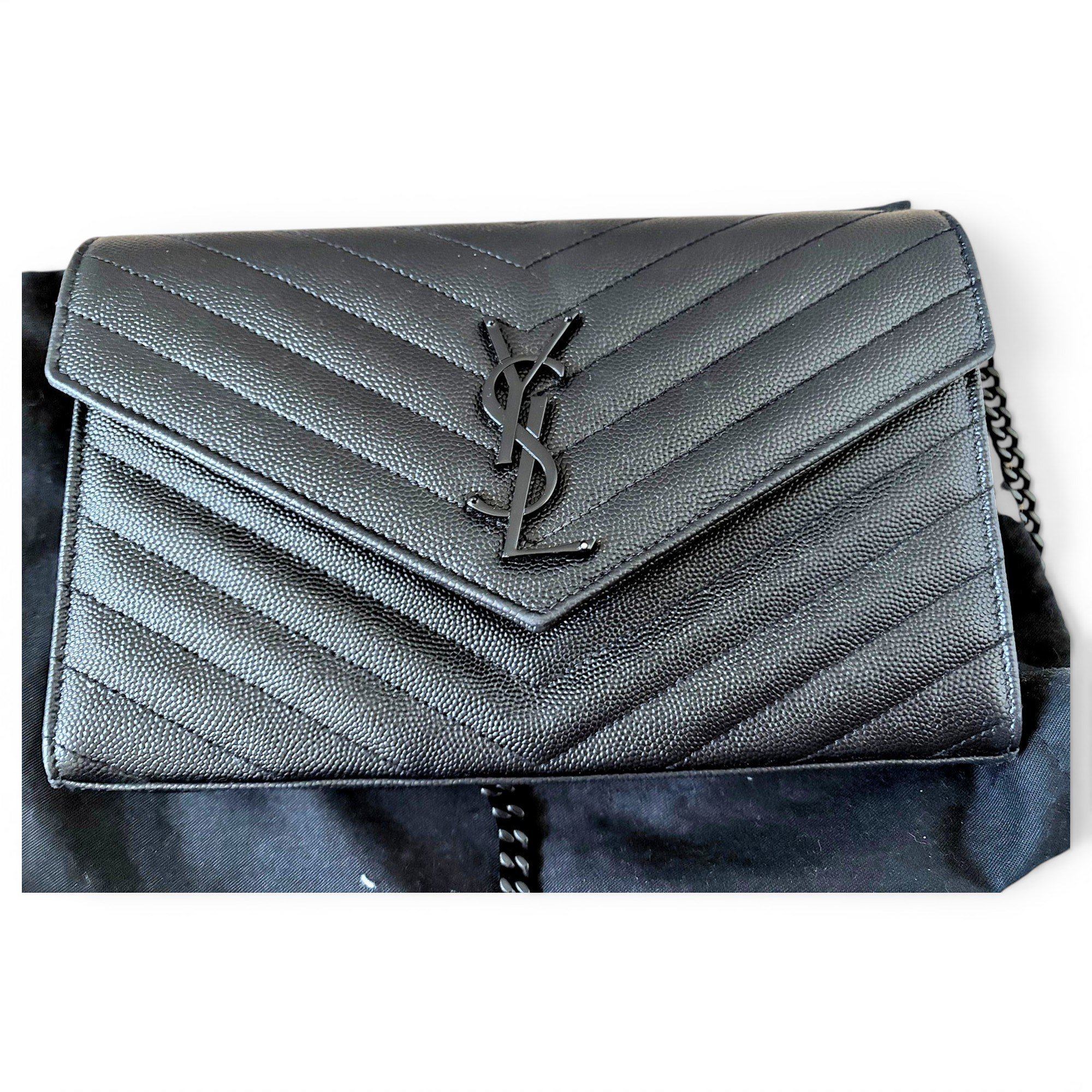 Cassandre leather clutch bag