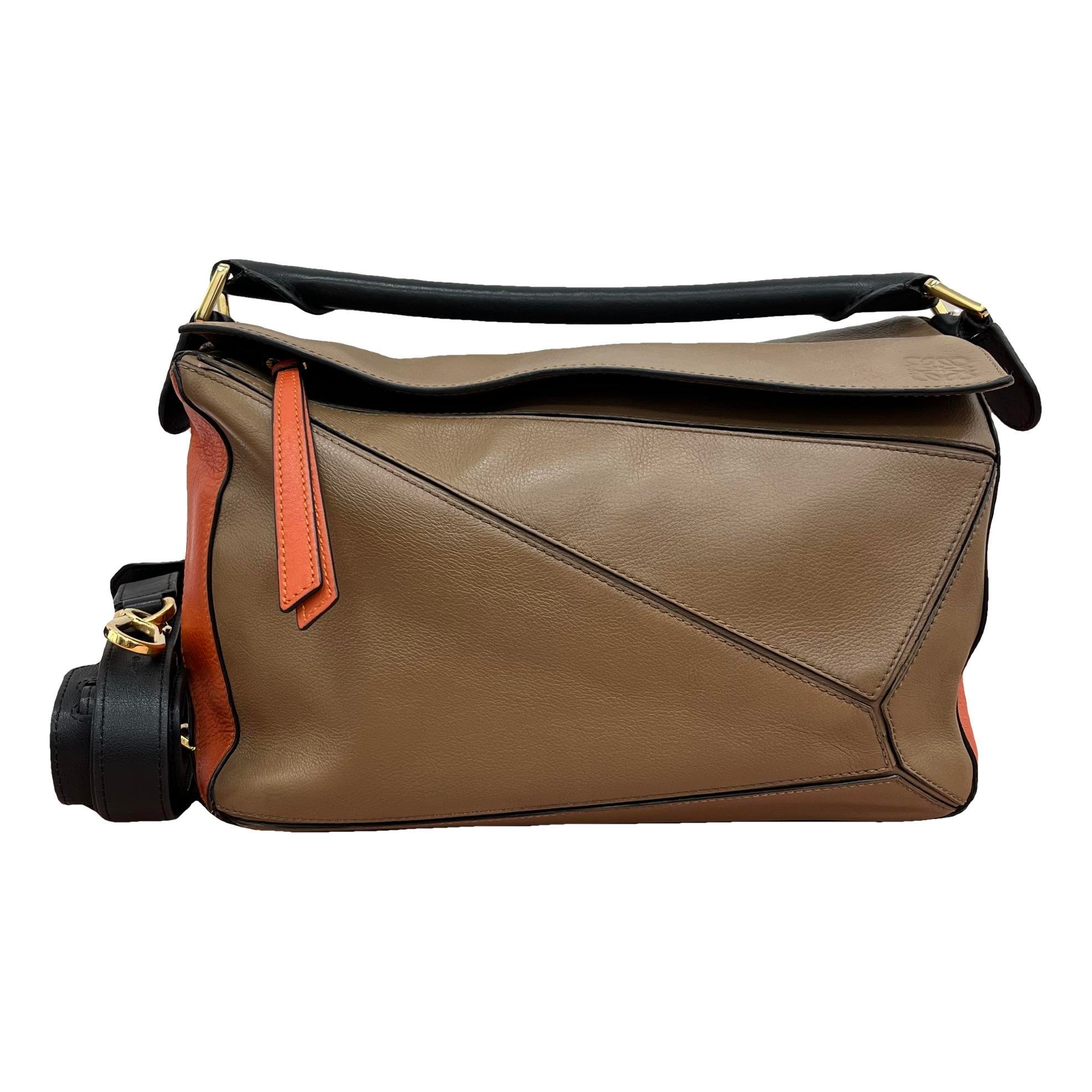 Puzzle leather handbag