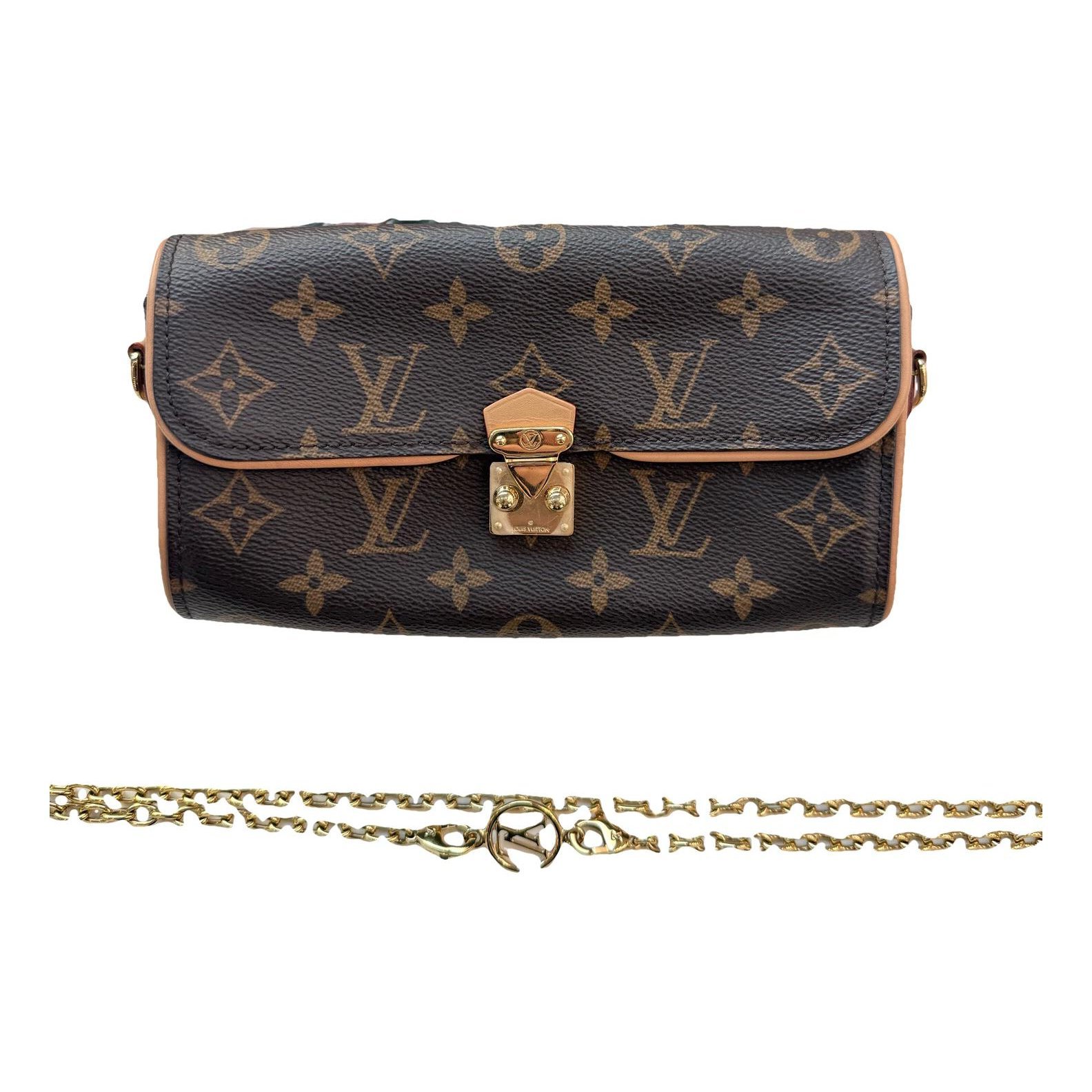 Pochette Trunk leather handbag