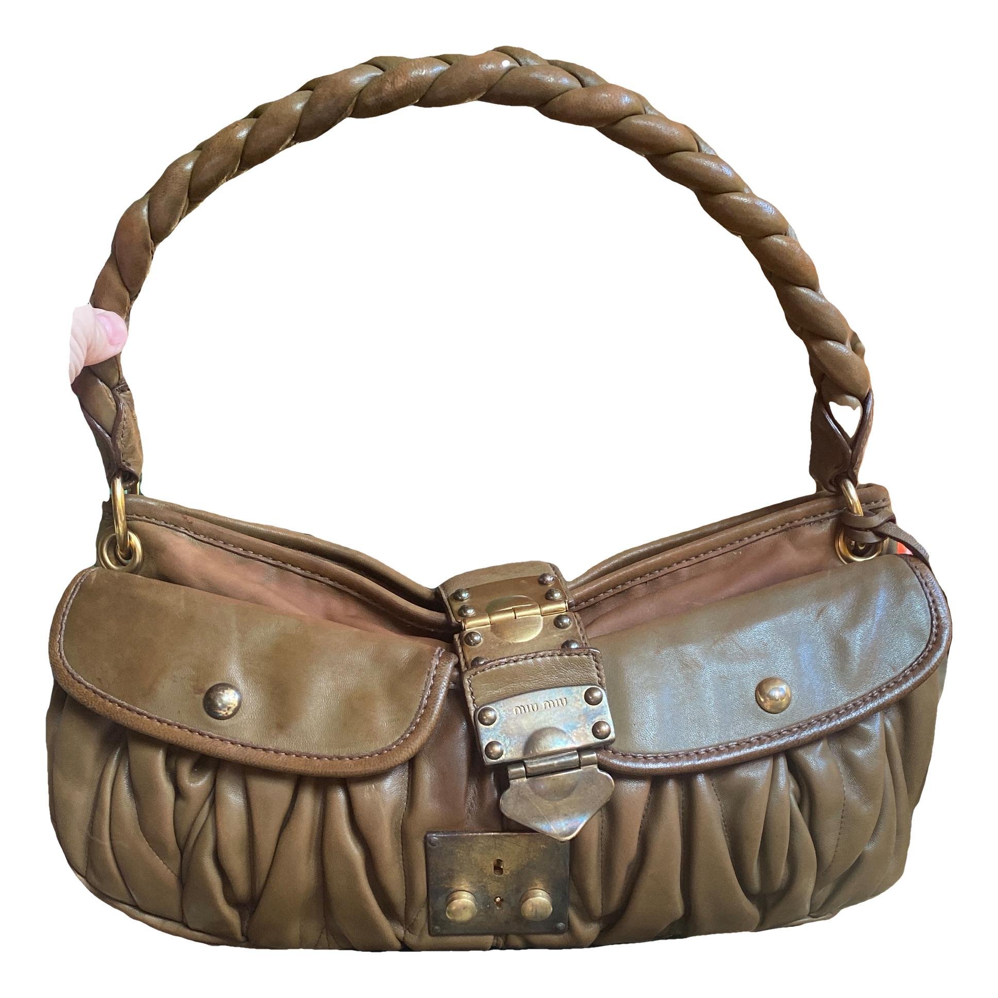 Coffer leather handbag