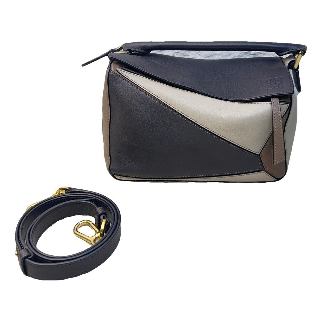 Puzzle leather handbag