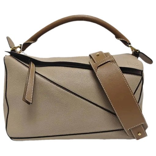 Puzzle leather handbag