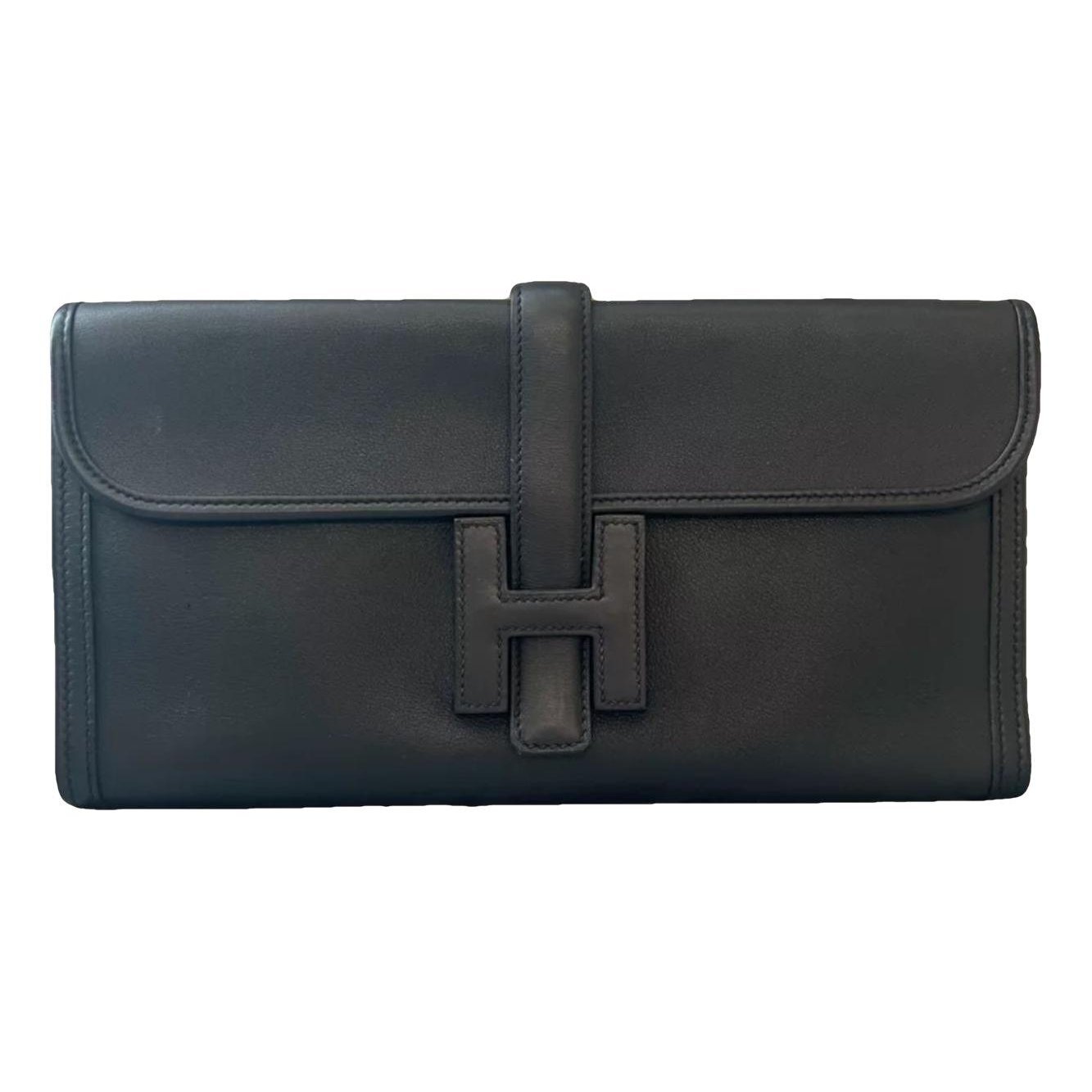Jige leather clutch bag