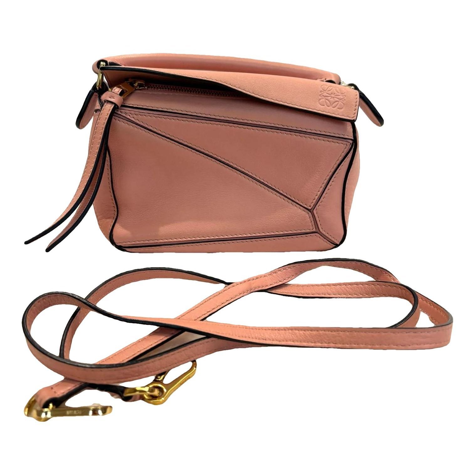 Puzzle leather crossbody bag