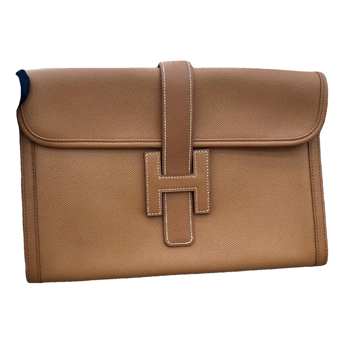 Jige leather clutch bag
