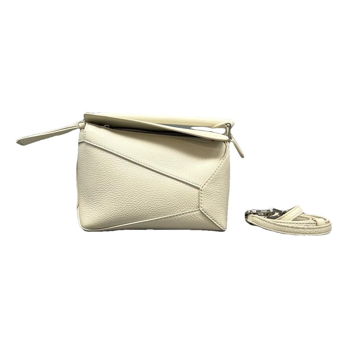 Puzzle leather handbag