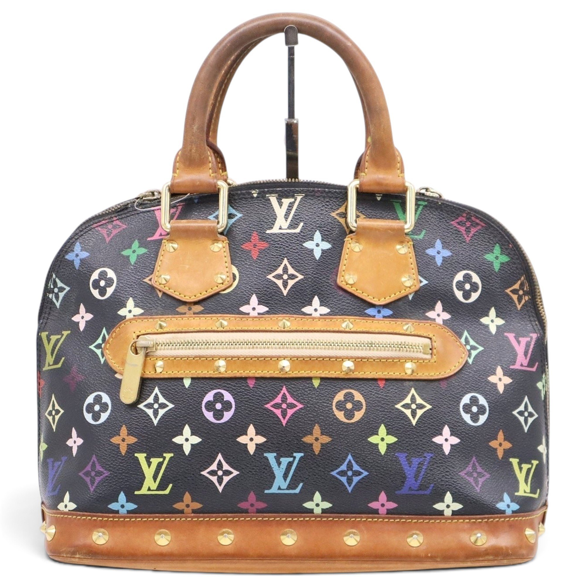 Louis Vuitton Alma cloth handbag