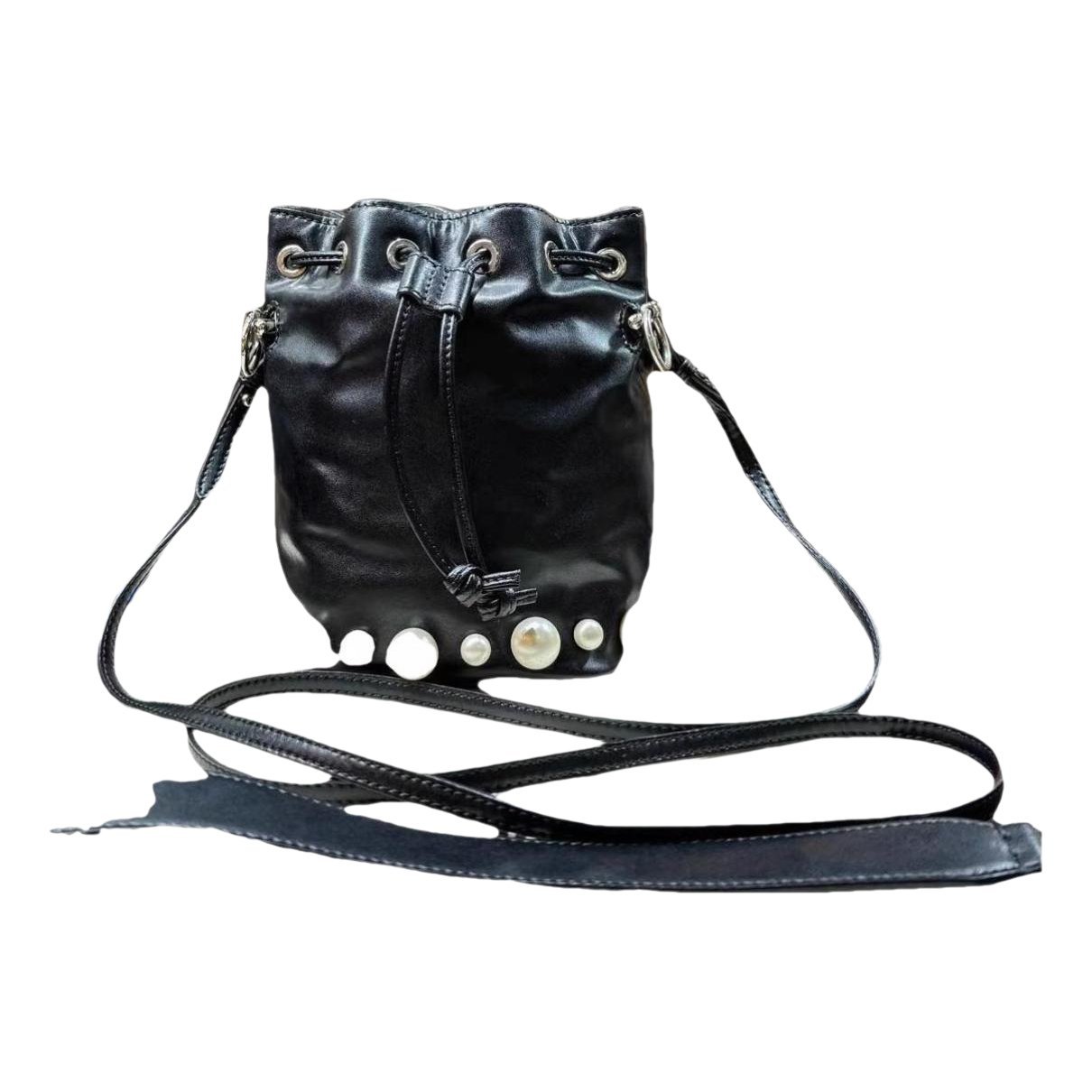 Mon Trésor leather handbag