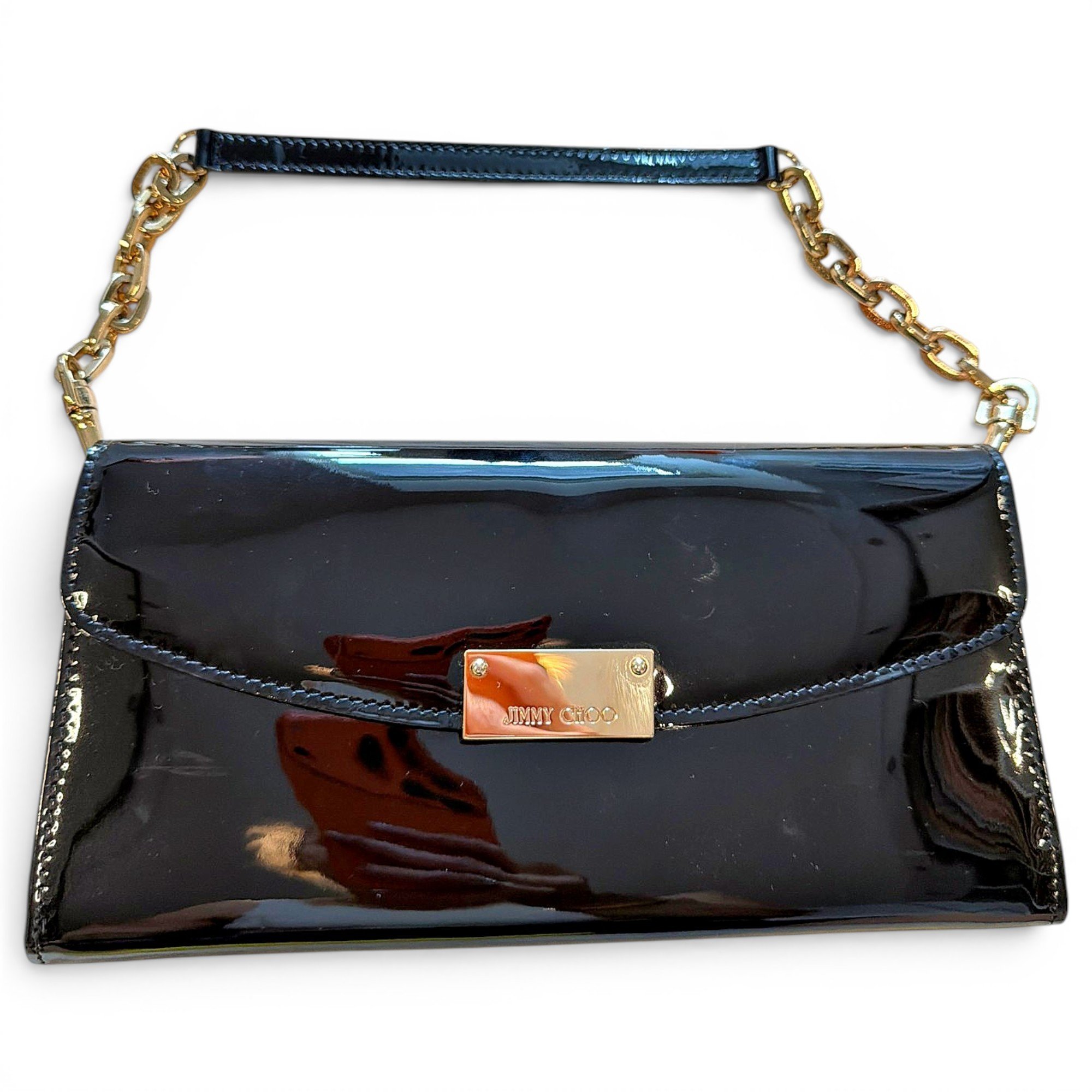 Patent leather clutch bag